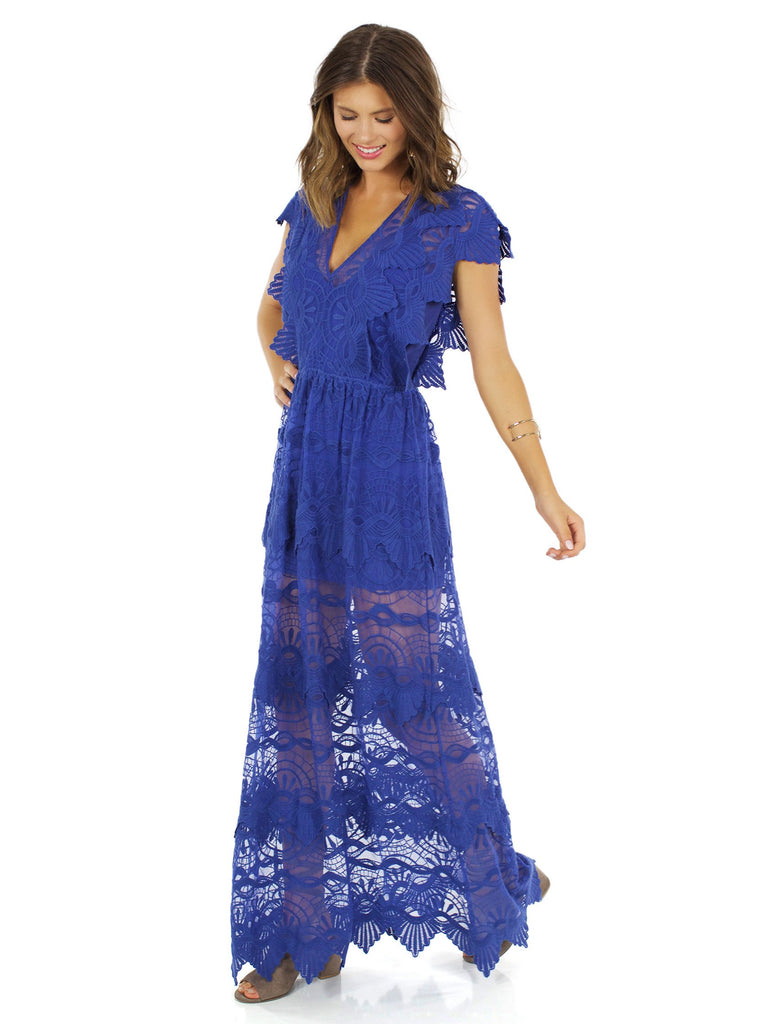 Woman wearing a dress rental from Nightcap Clothing called Imperial Maxi Dress