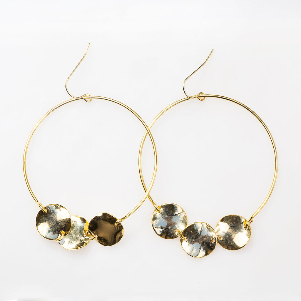Women outfit in a earrings rental from 8 Other Reasons called Sonar Hoop