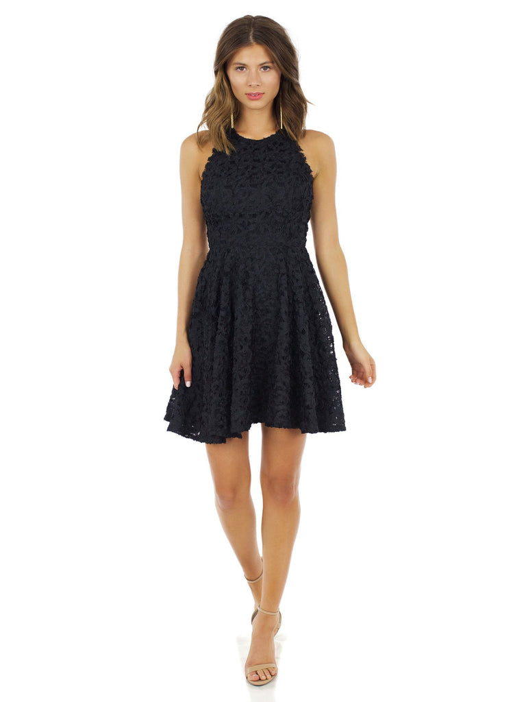 Women outfit in a dress rental from Ali & Jay called Lily Pond Fit & Flare Dress