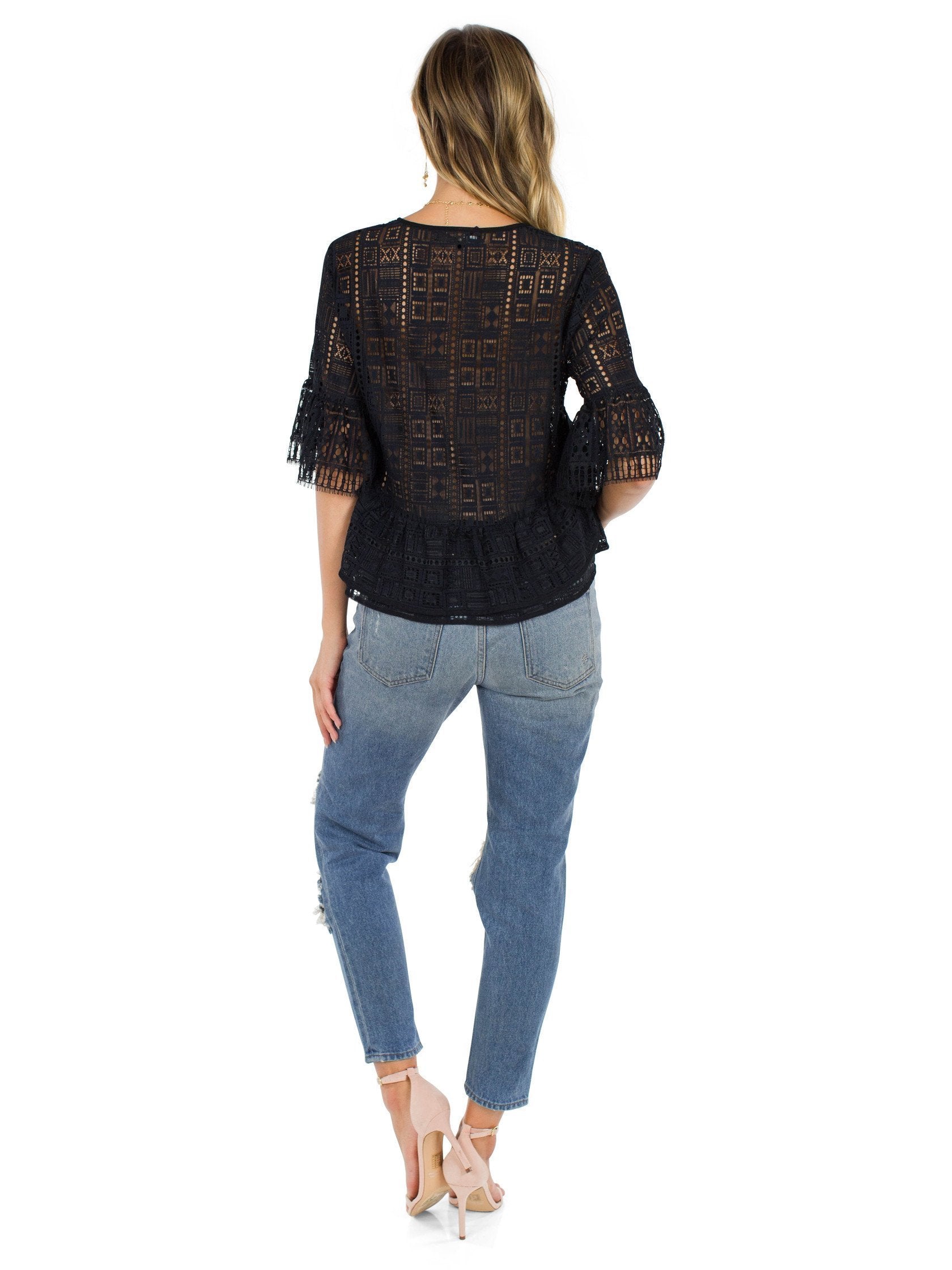 Women outfit in a top rental from BCBGMAXAZRIA called Immane Ruffled Lace Top