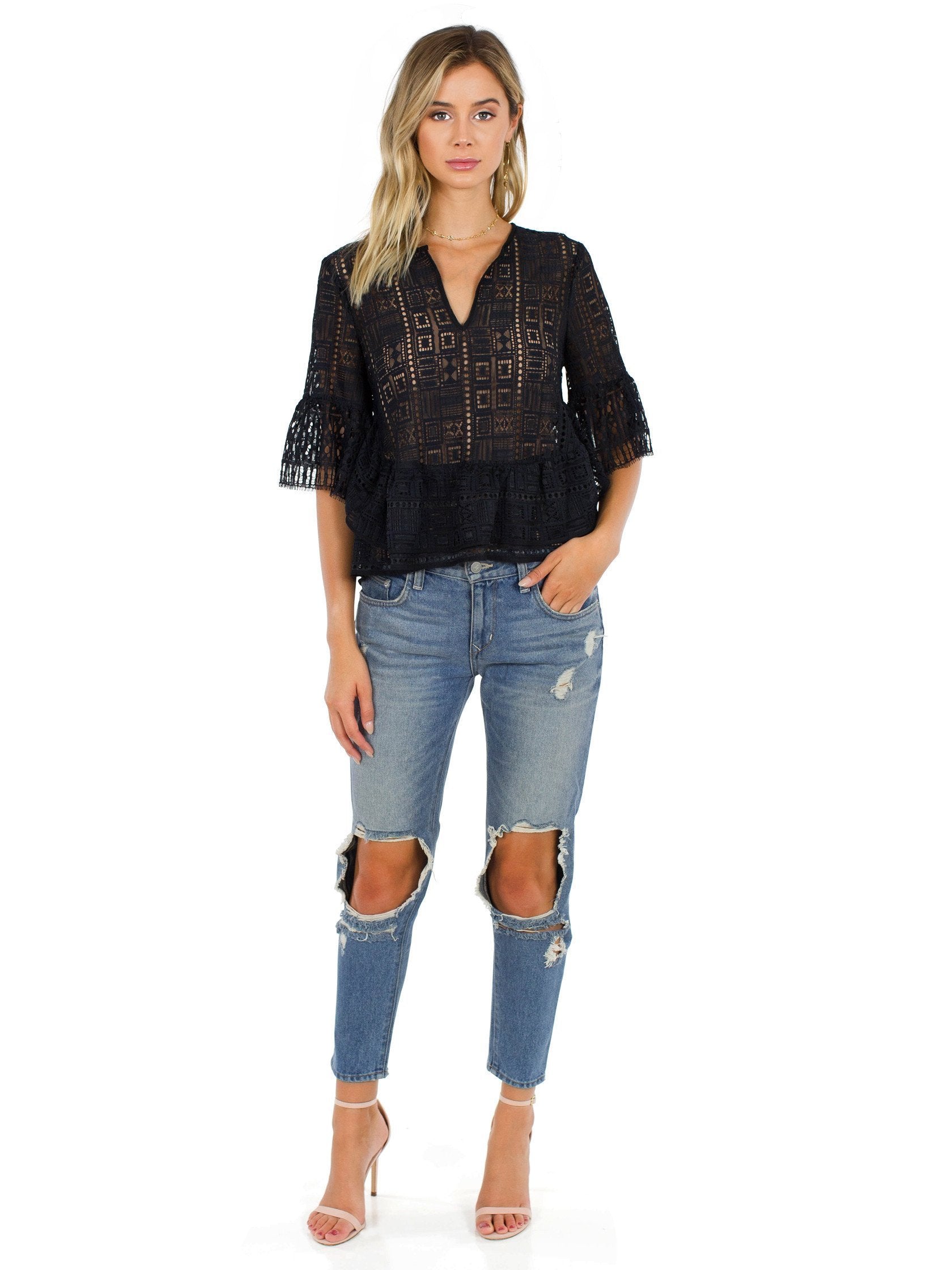 Girl wearing a top rental from BCBGMAXAZRIA called Immane Ruffled Lace Top