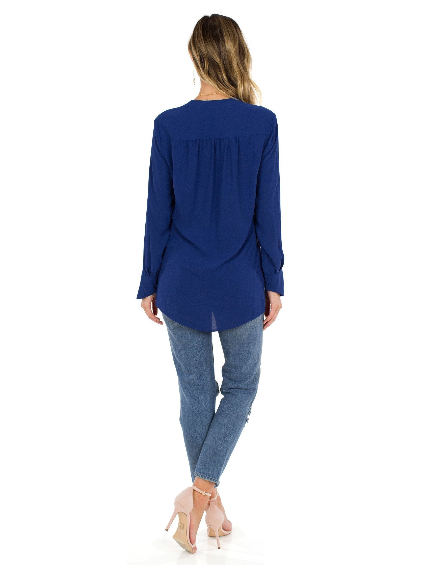 Women outfit in a top rental from BCBGMAXAZRIA called Jaklyn Draped-front Blouse