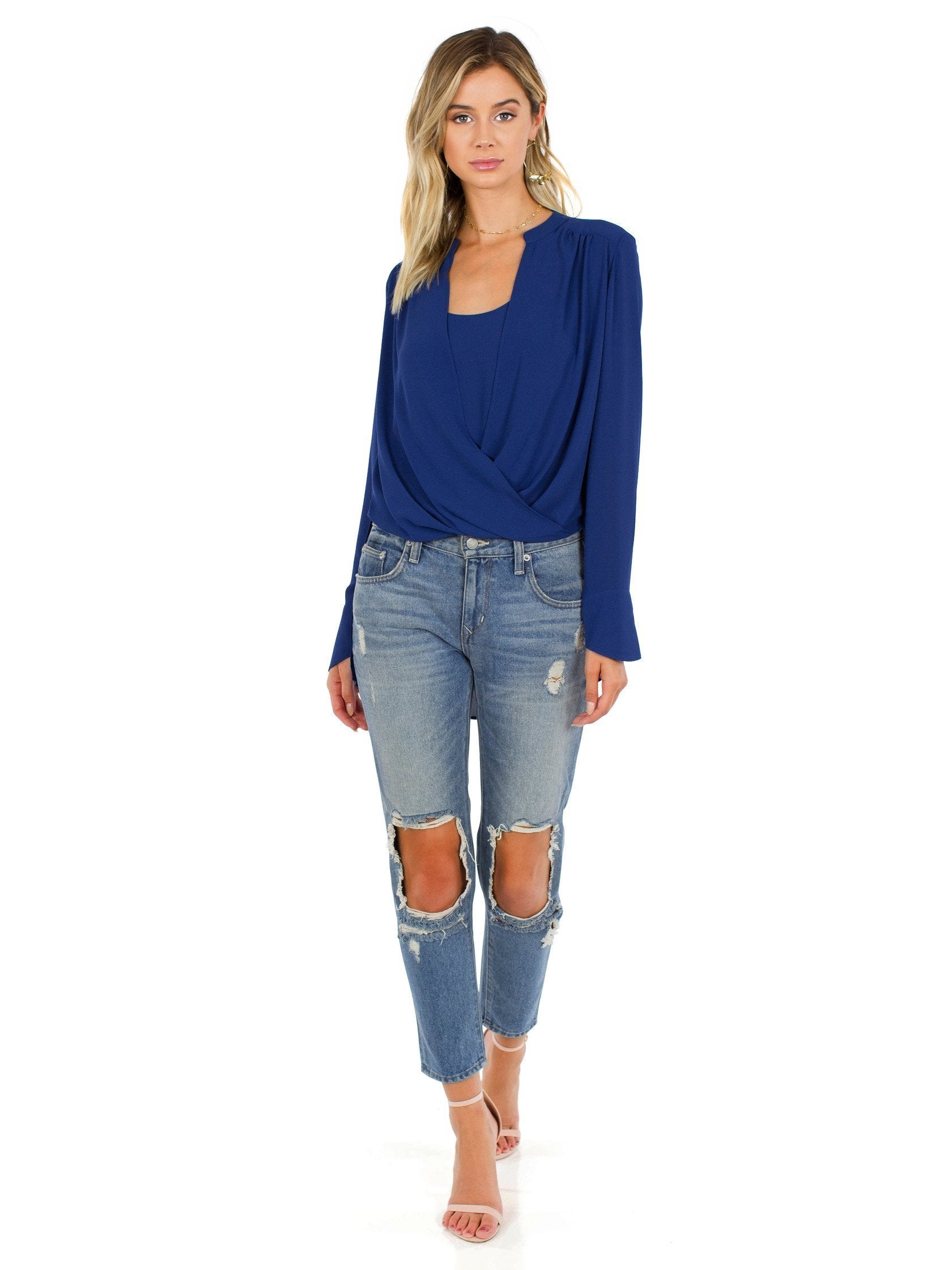 Girl wearing a top rental from BCBGMAXAZRIA called Jaklyn Draped-front Blouse