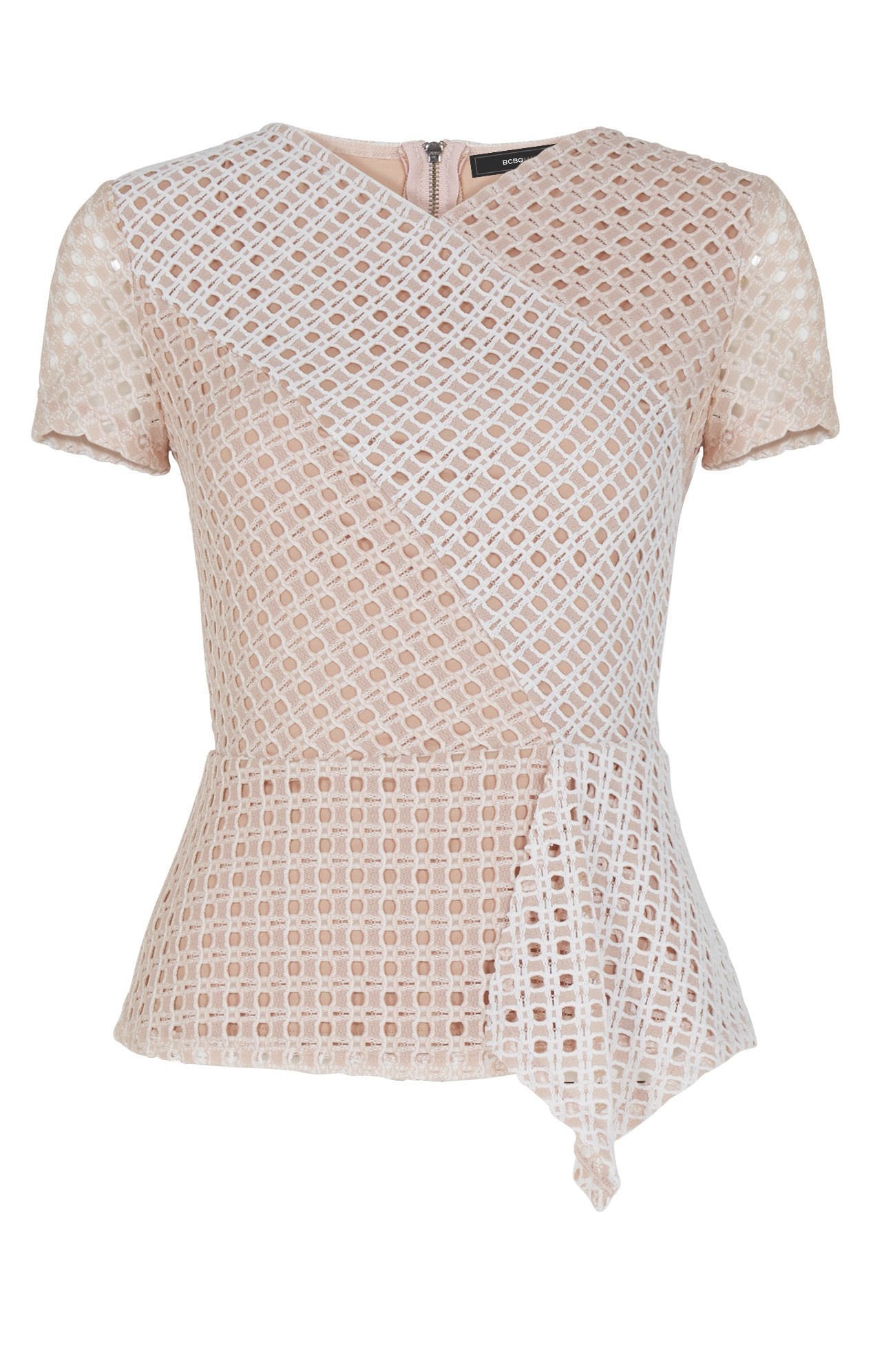 Woman wearing a top rental from BCBGMAXAZRIA called Kaleigh Lace-blocked Peplum Top