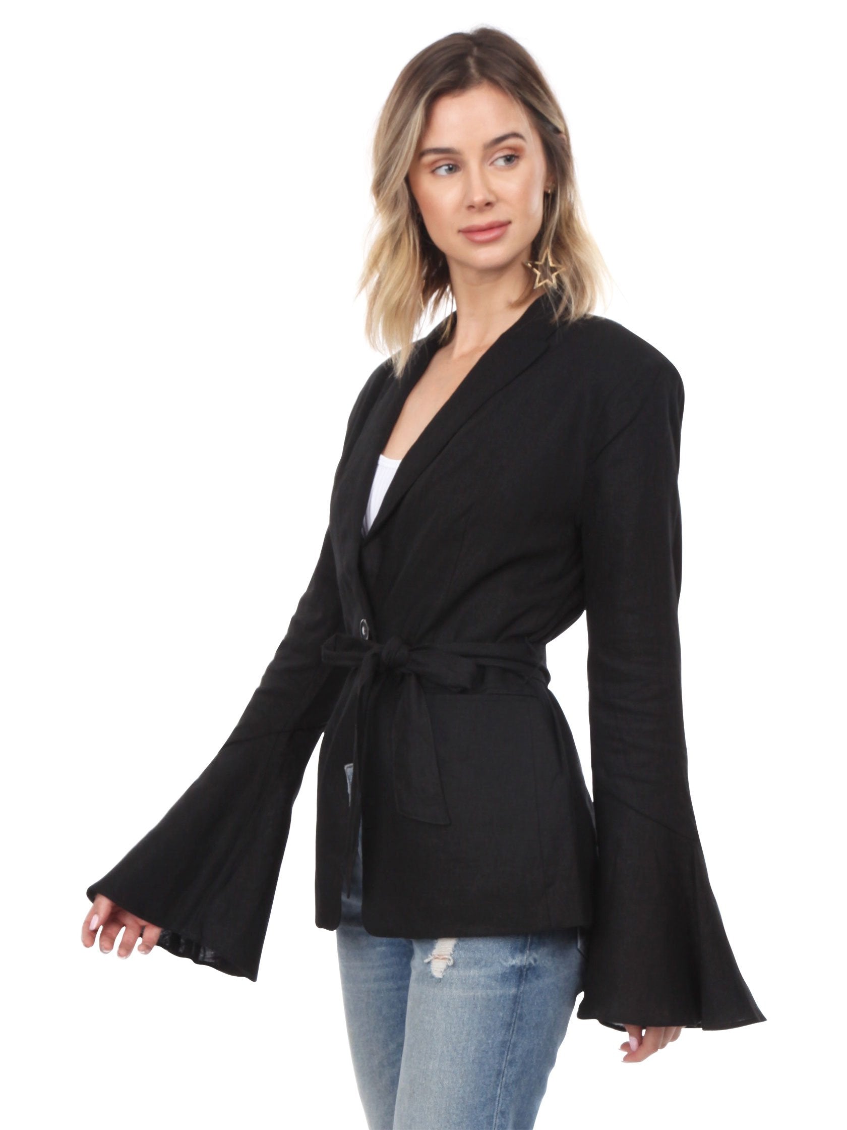 Woman wearing a blazer rental from Free People called Belted Blazer