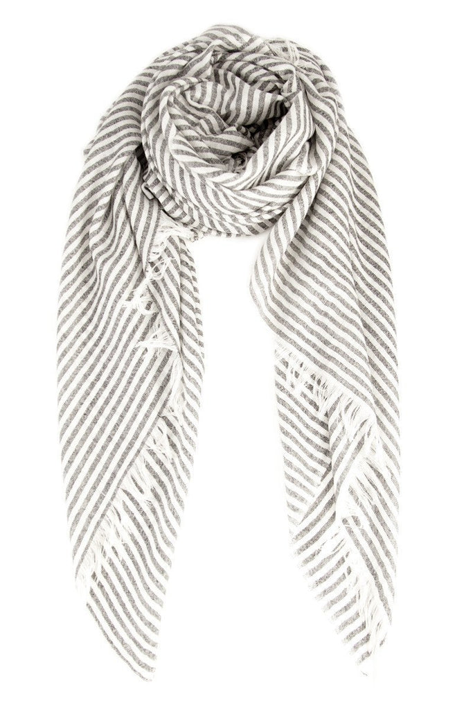 Women wearing a scarf rental from Chan Luu called Stripe Cashmere And Silk Scarf