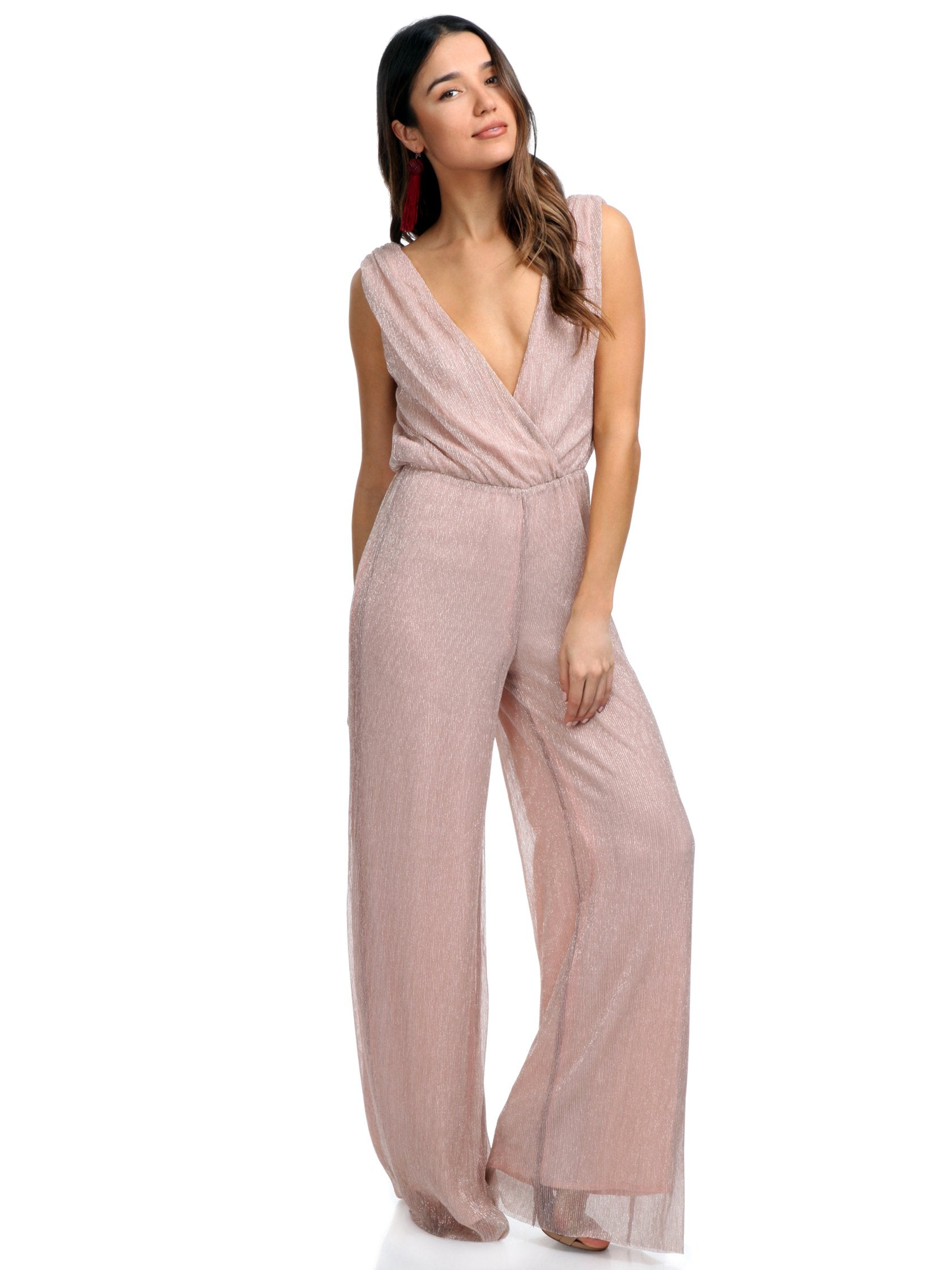 Woman wearing a jumpsuit rental from Line & Dot called Doux Jumpsuit