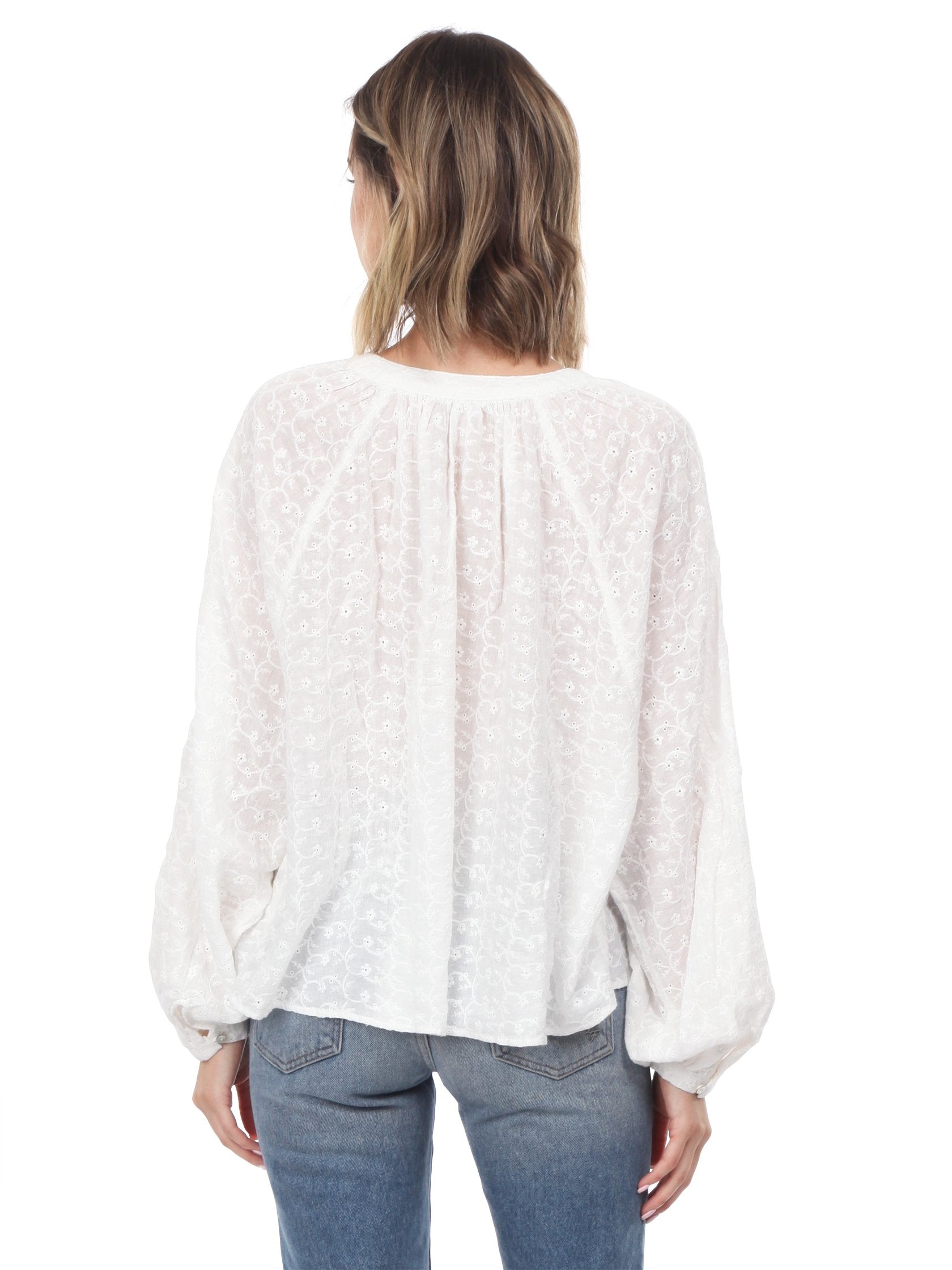 Women outfit in a top rental from Free People called Down From The Clouds Peasant Top