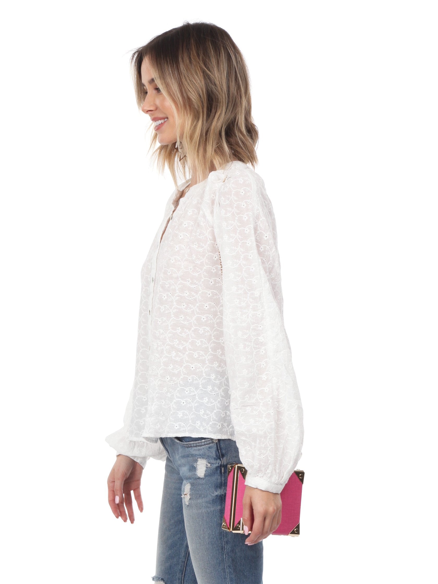 Women wearing a top rental from Free People called Down From The Clouds Peasant Top