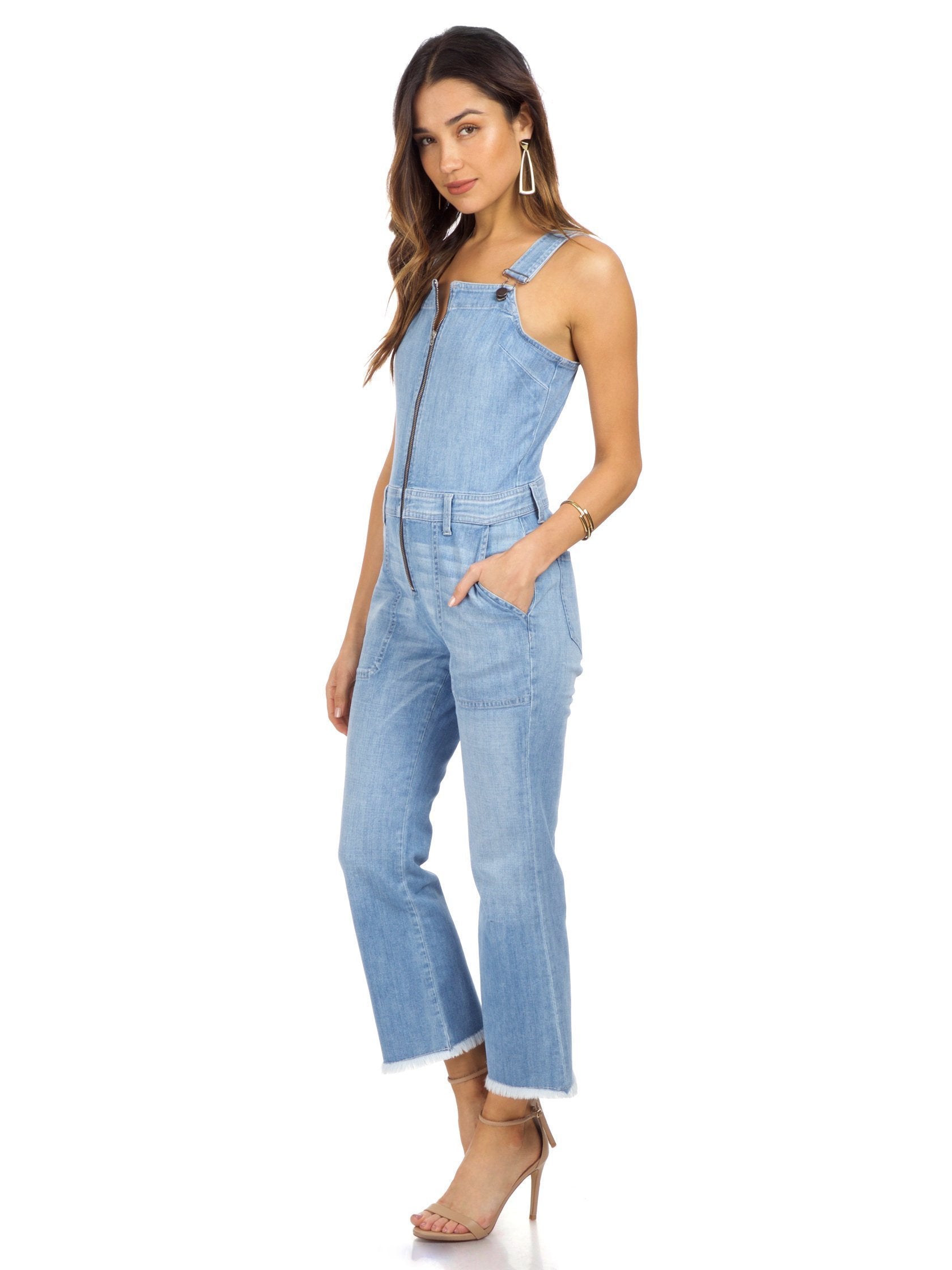 Woman wearing a jumpsuit rental from ei8ht dreams called Flare Overall