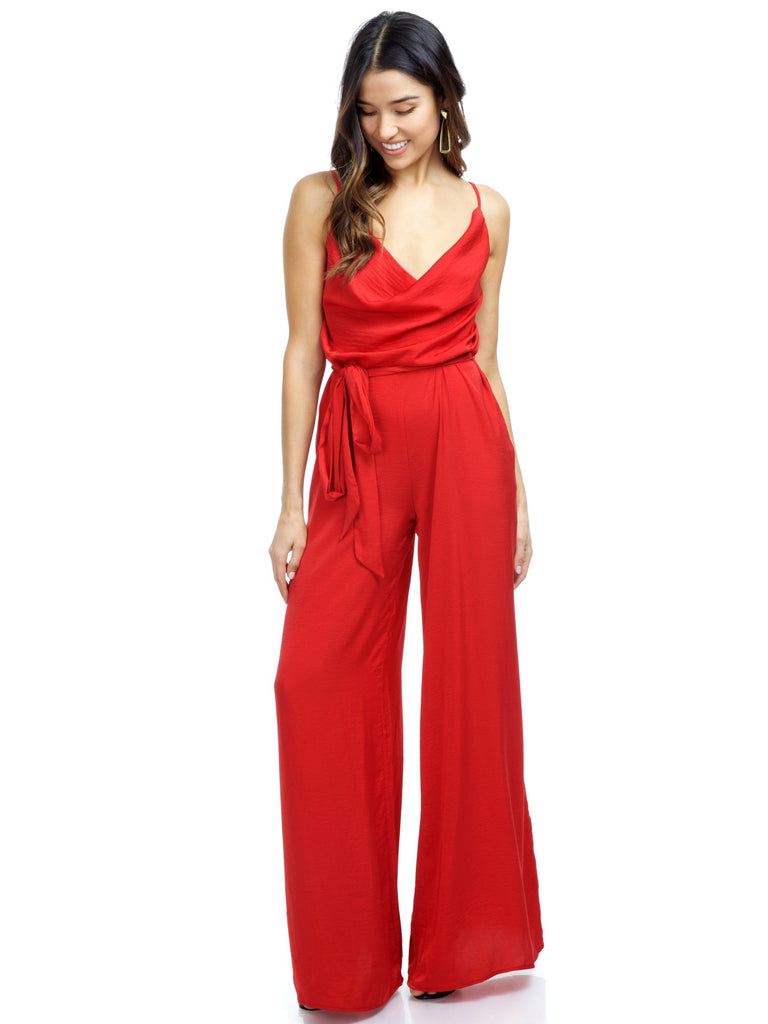 Woman wearing a jumpsuit rental from The Jetset Diaries called Cherri Dress