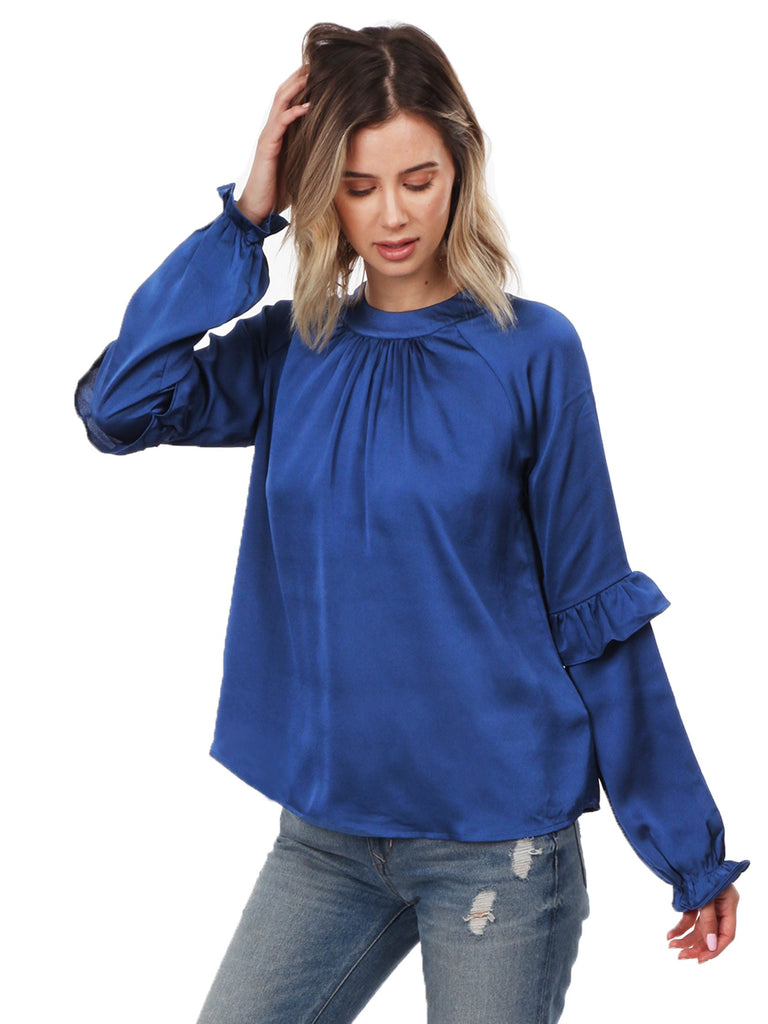 Woman wearing a top rental from LOST + WANDER called Cold Shoulder Blouson Sleeve Blouse