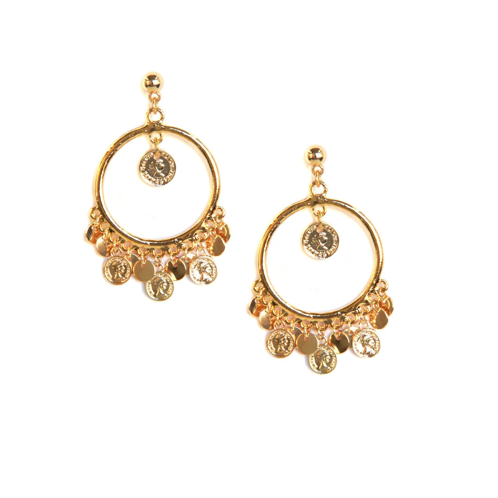 Woman wearing a earring rental from Ettika called Desert Ranch Bolo Wrap In Light Grey And Gold