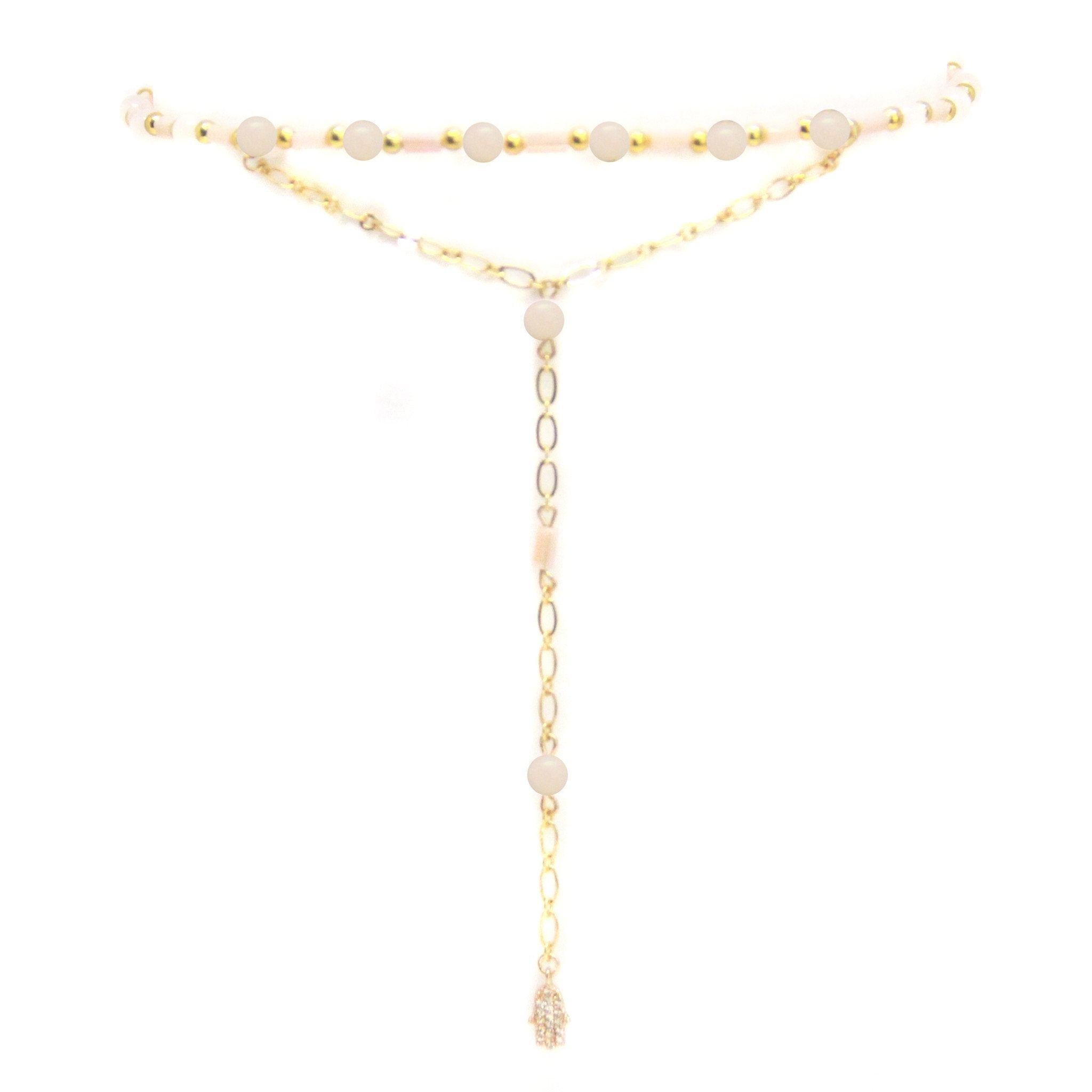 Women outfit in a choker rental from Ettika called Love Me Lariat In Pink And Gold With Hamsa