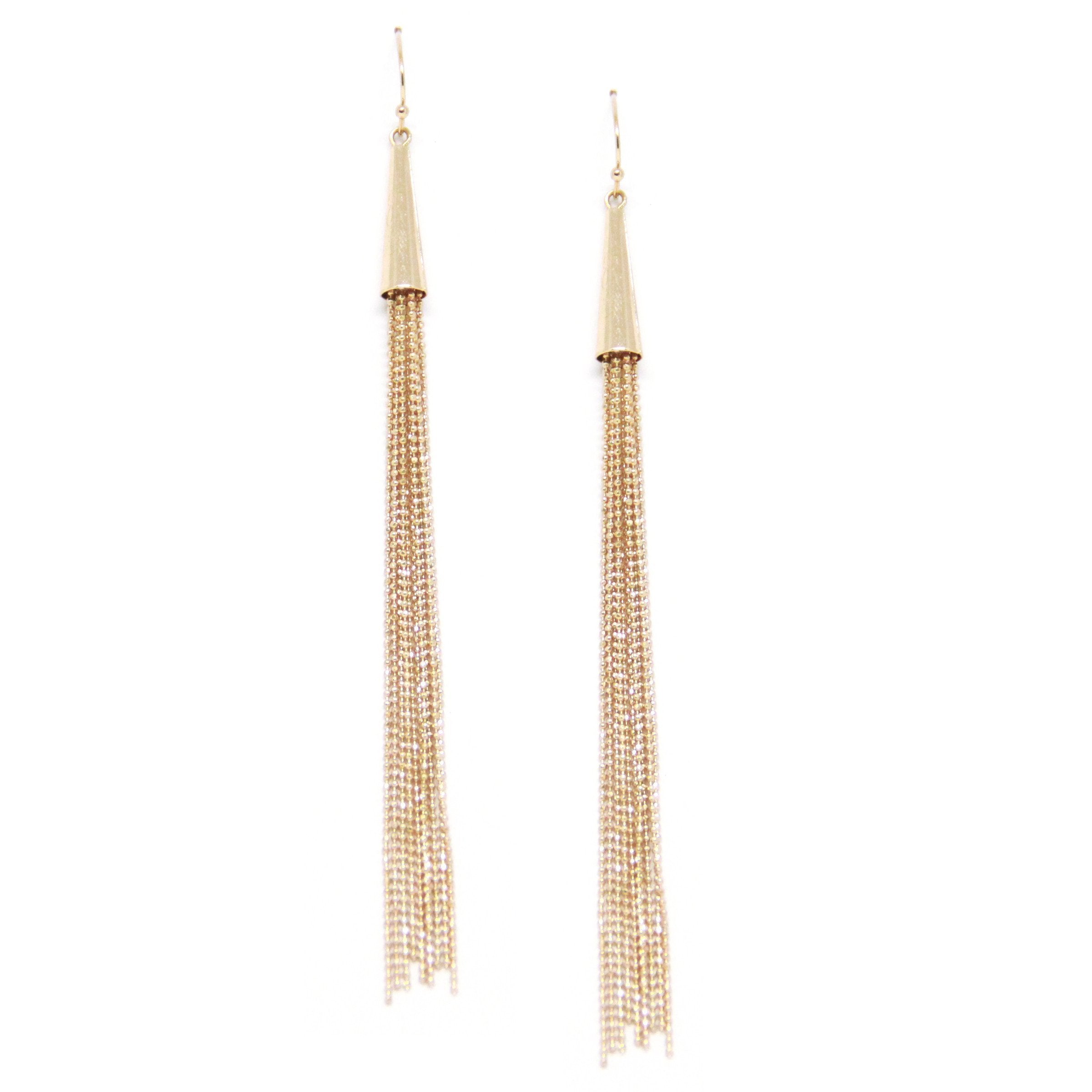 Women outfit in a earrings rental from Ettika called Straight And Narrow Earring In Gold