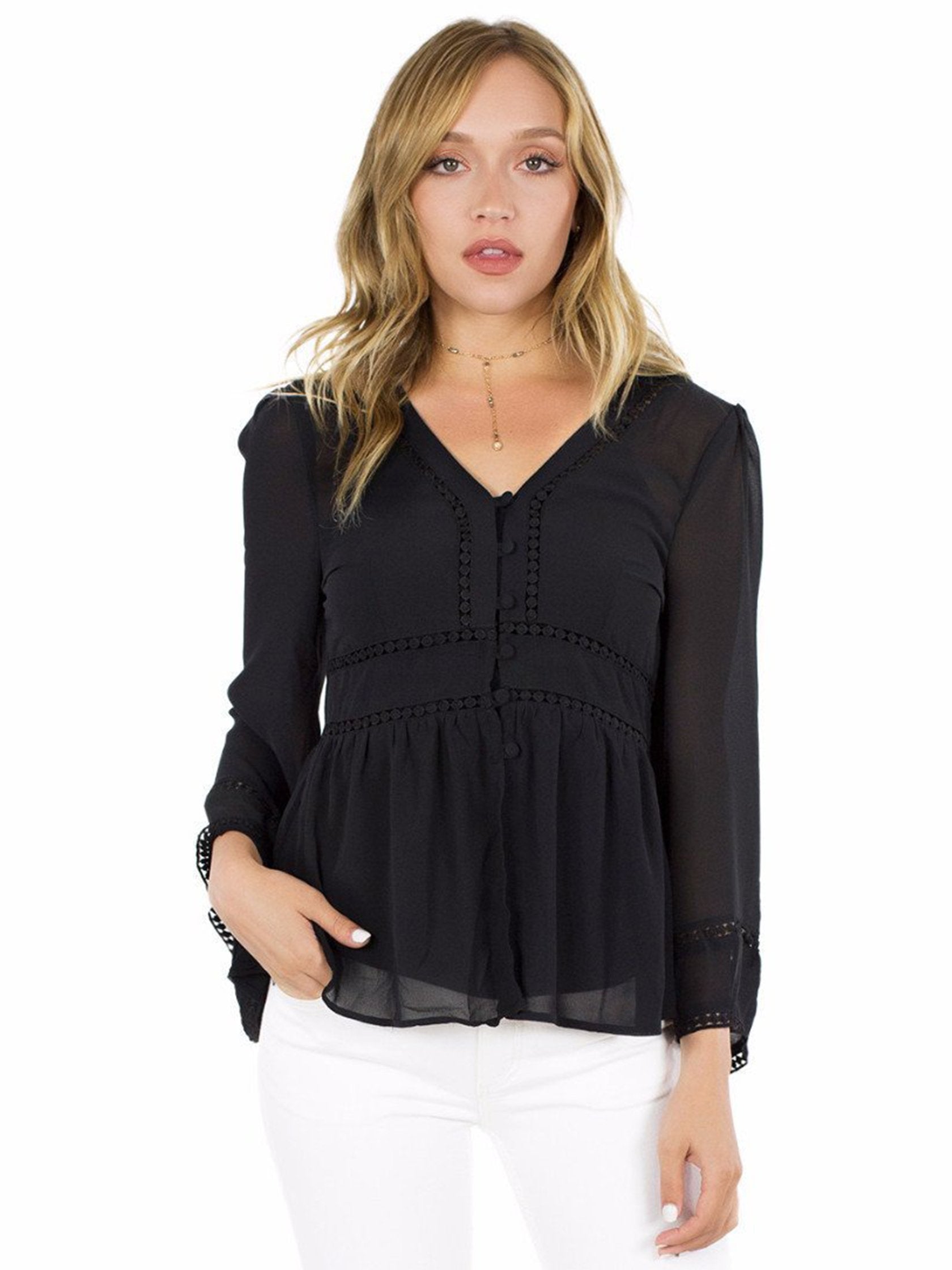 Woman wearing a top rental from FashionPass called All Buttoned Up Shirt