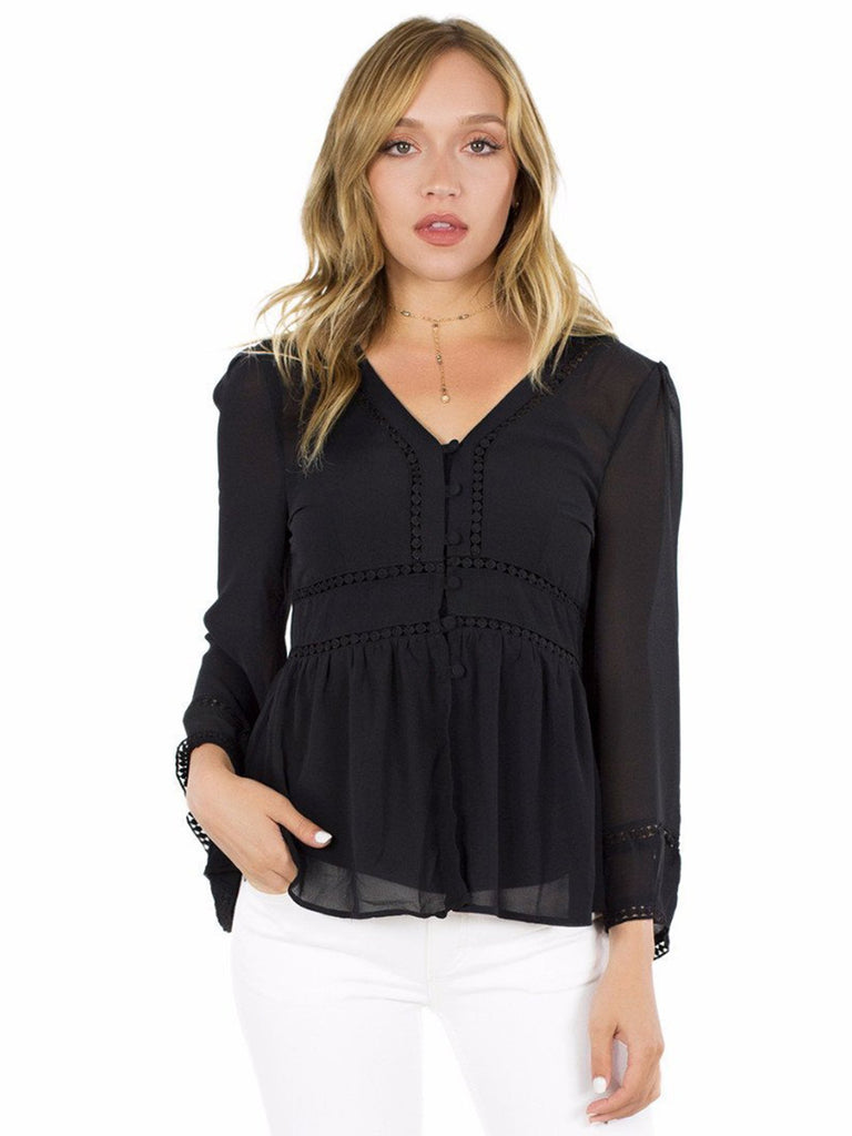 Women outfit in a top rental from FashionPass called Harmony Cold Shoulder Sweater