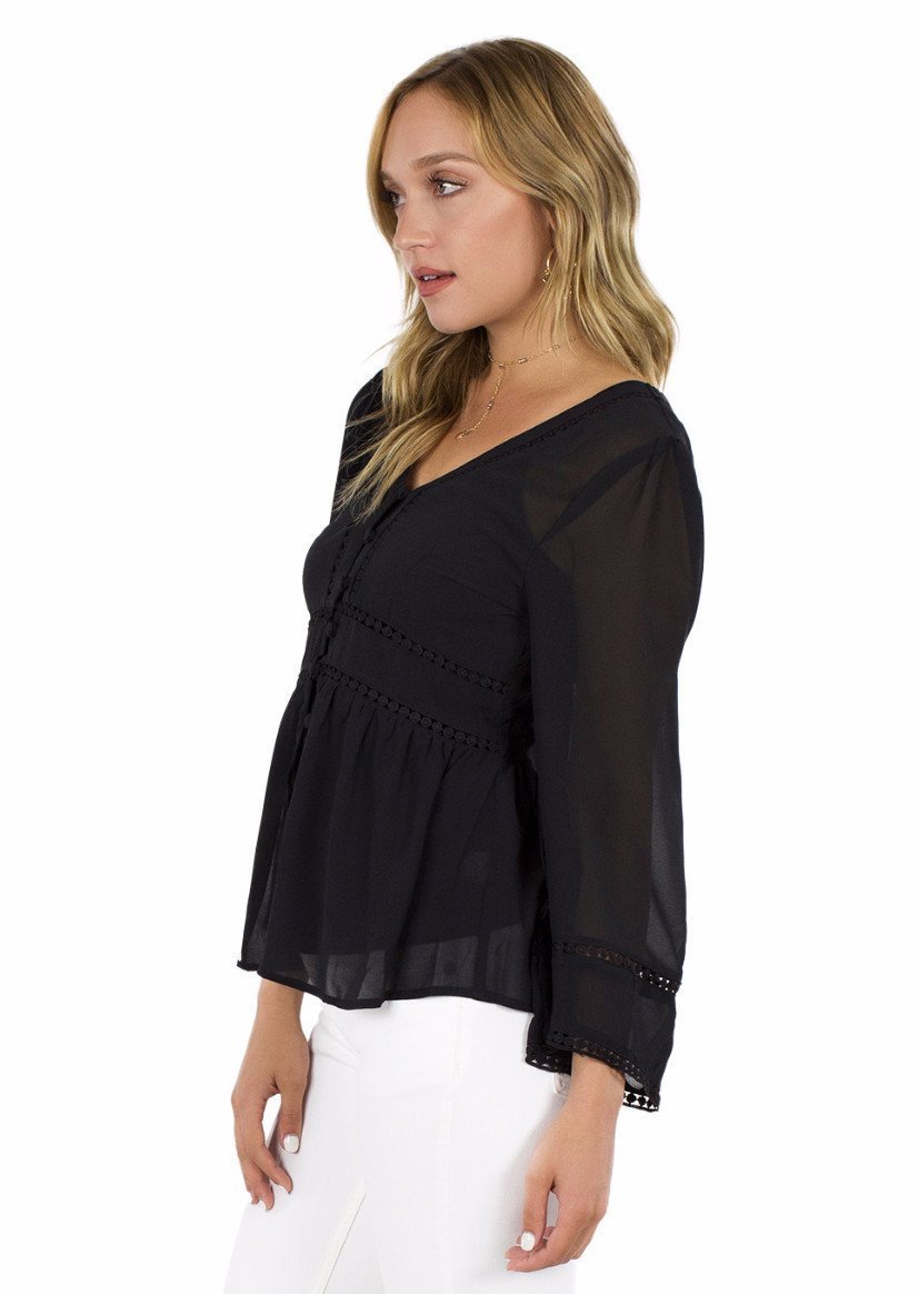 Women wearing a top rental from FashionPass called All Buttoned Up Shirt