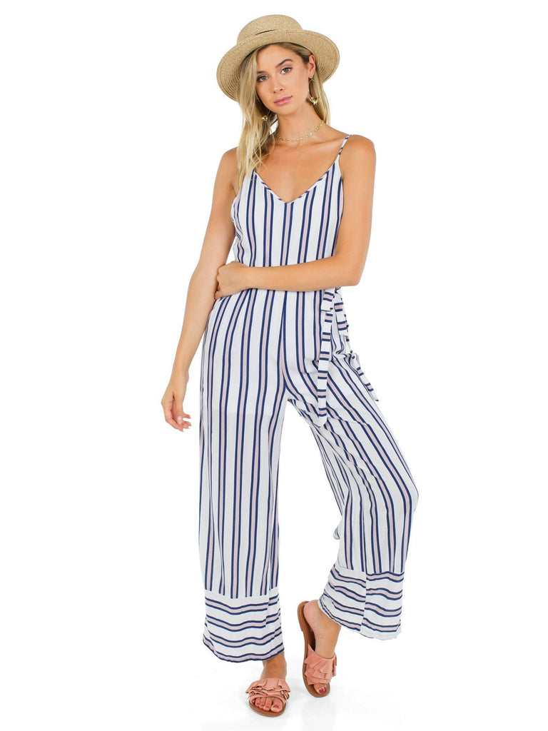 Women outfit in a jumpsuit rental from FashionPass called Romper Overlay Dress