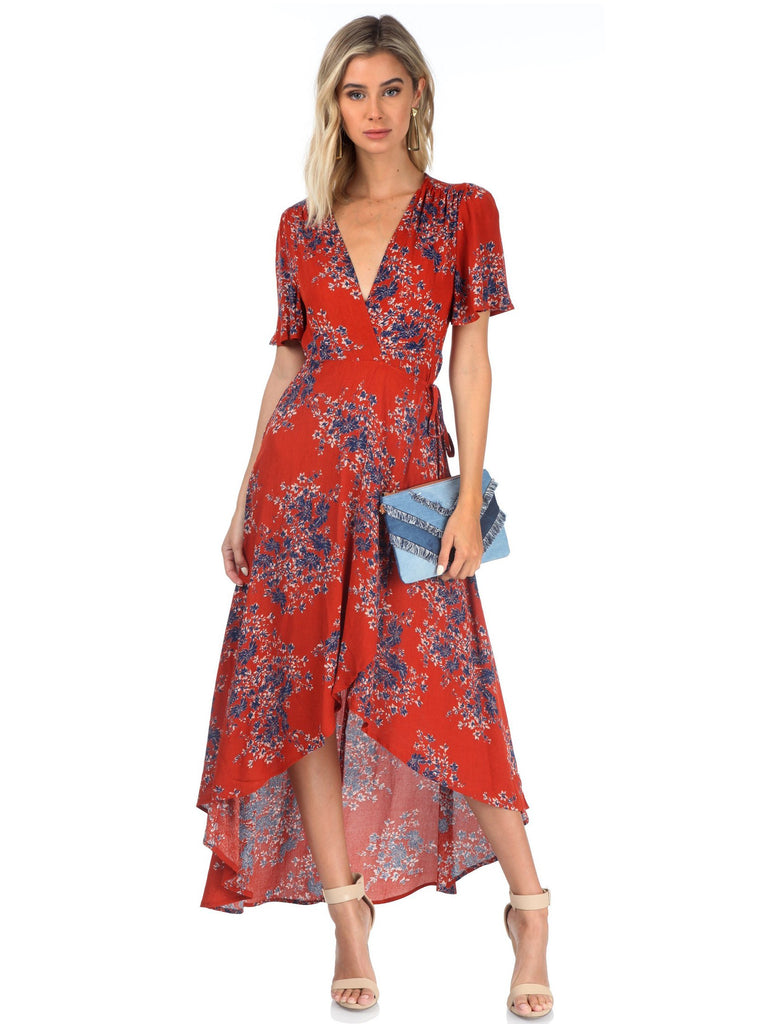 Women outfit in a dress rental from FashionPass called Carolina Wrap Dress