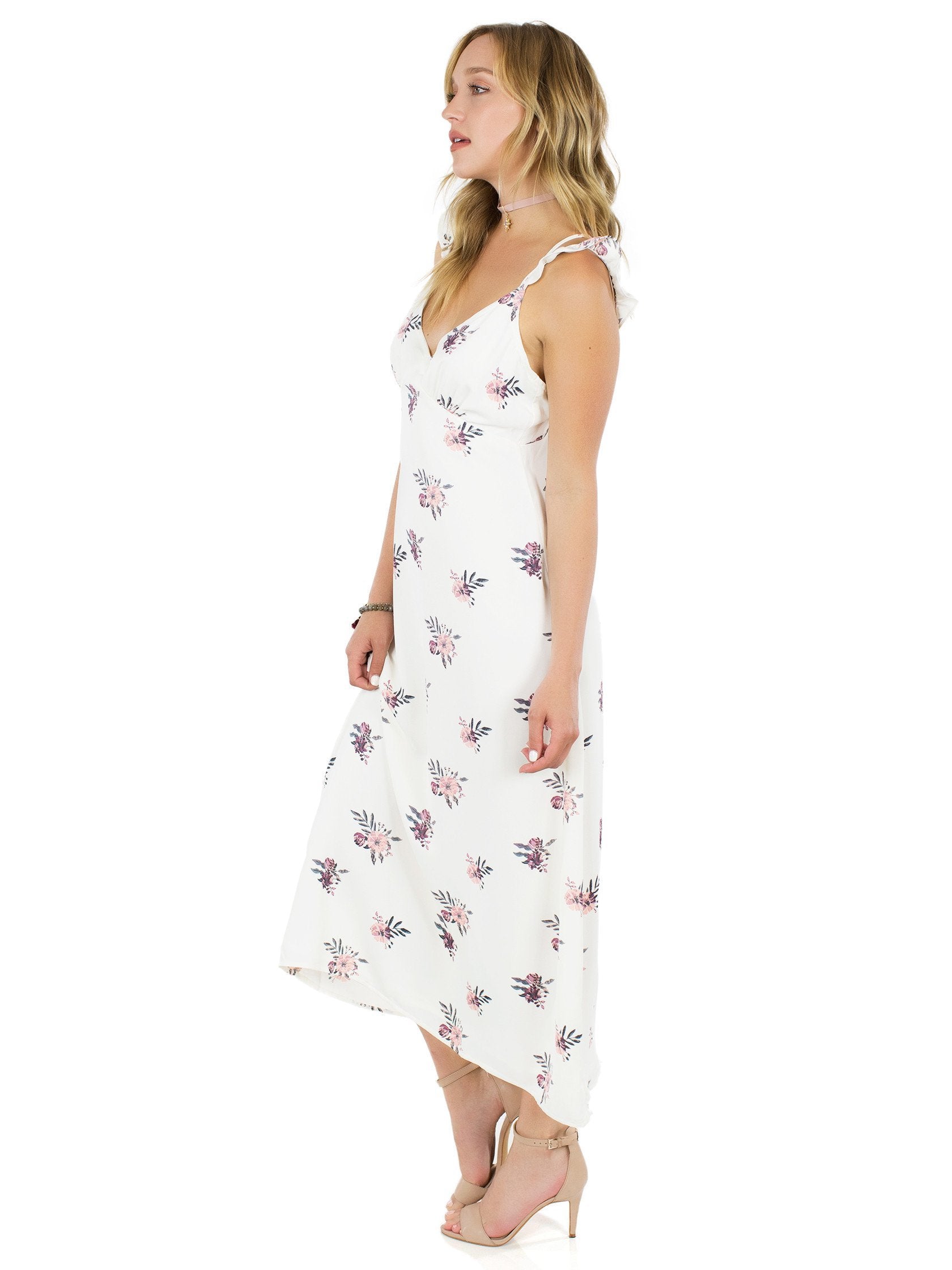 Woman wearing a dress rental from FashionPass called Spring Fling Dress