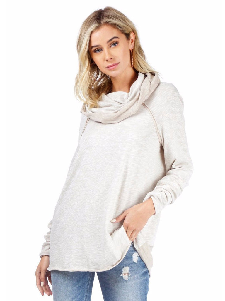 Women wearing a sweater rental from Free People called Beach Cocoon Cowl Neck Pullover