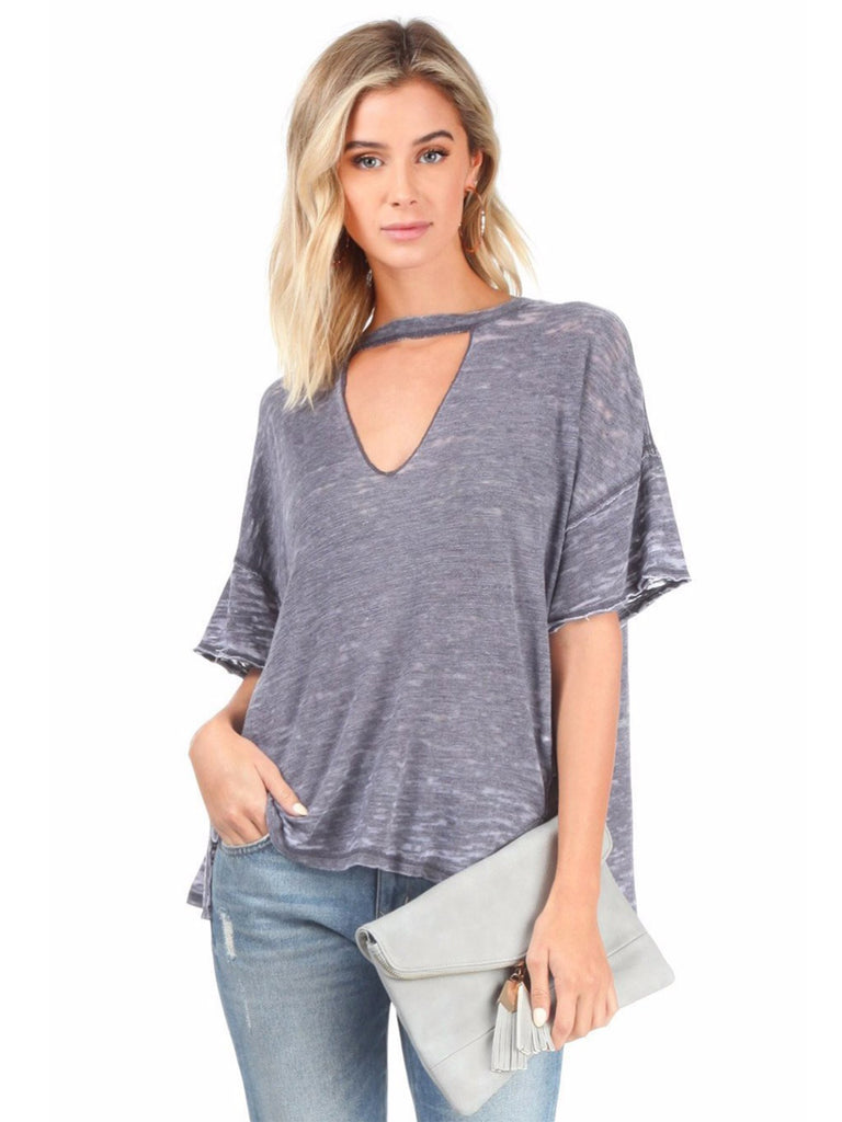 Women outfit in a top rental from Free People called Cross Shoulder Top
