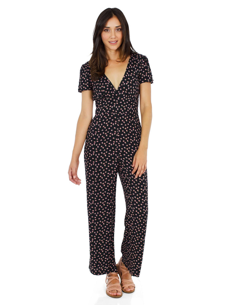 Women outfit in a jumpsuit rental from Free People called She Moves Slip