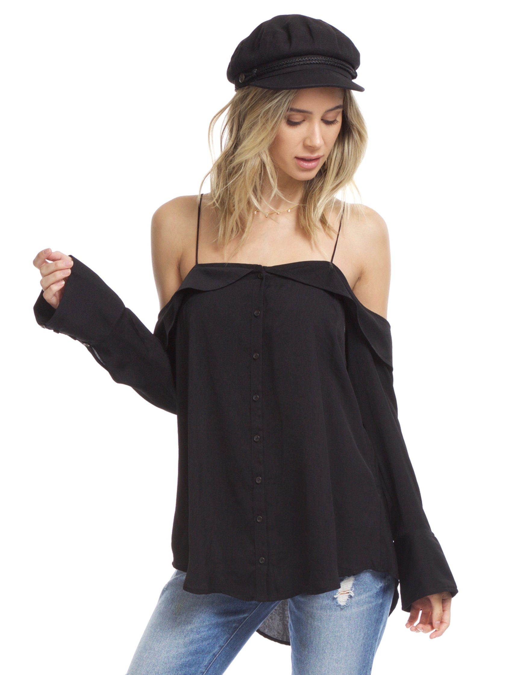 Woman wearing a top rental from Free People called Walk This Way Buttondown Top