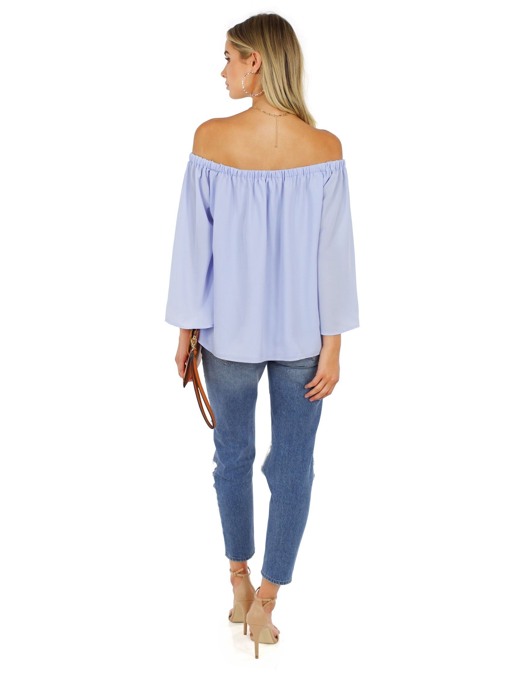 Women wearing a top rental from French Connection called Off Shoulder Top