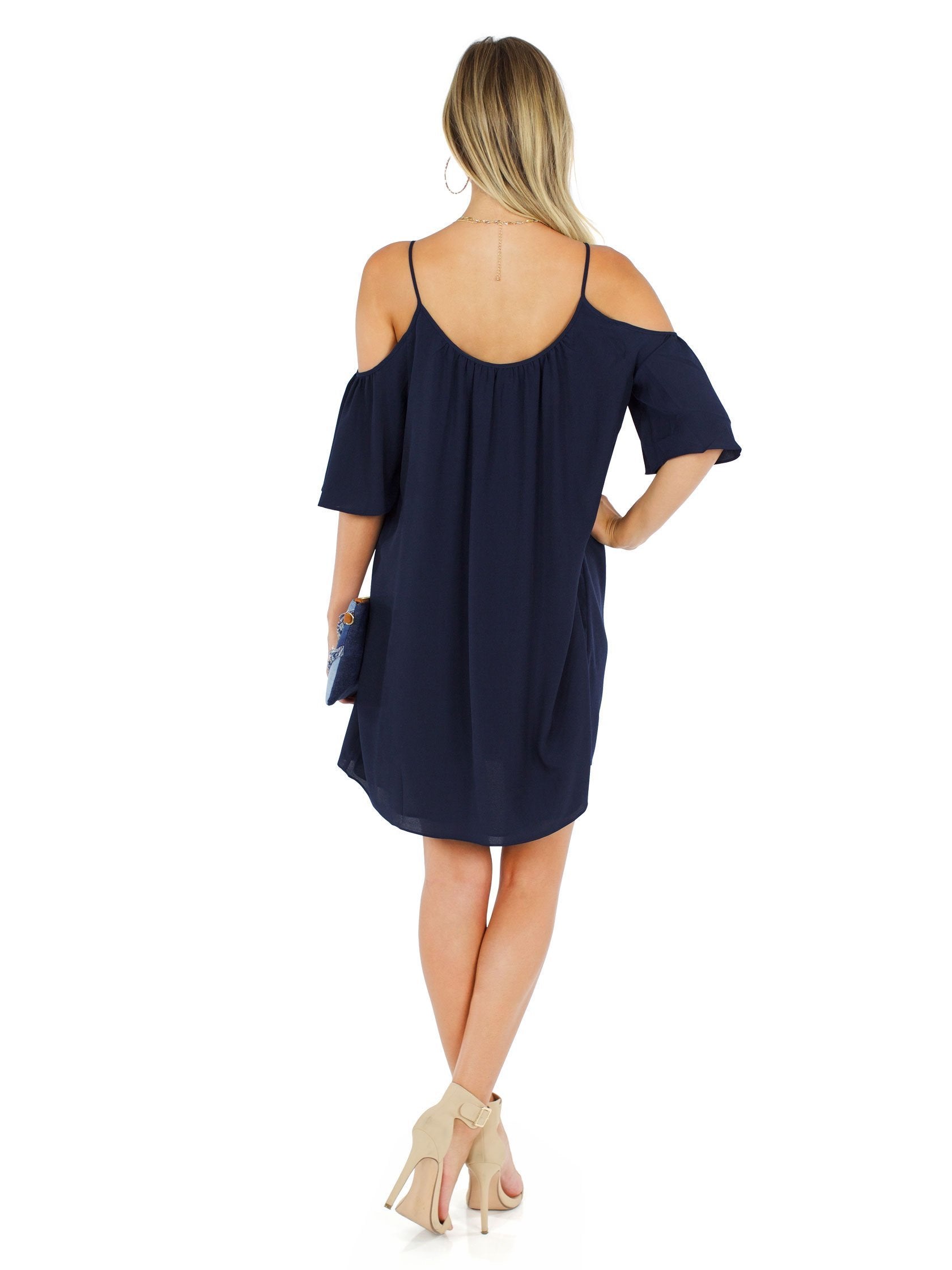 Women wearing a dress rental from French Connection called Polly Plains Cold Shoulder Dress