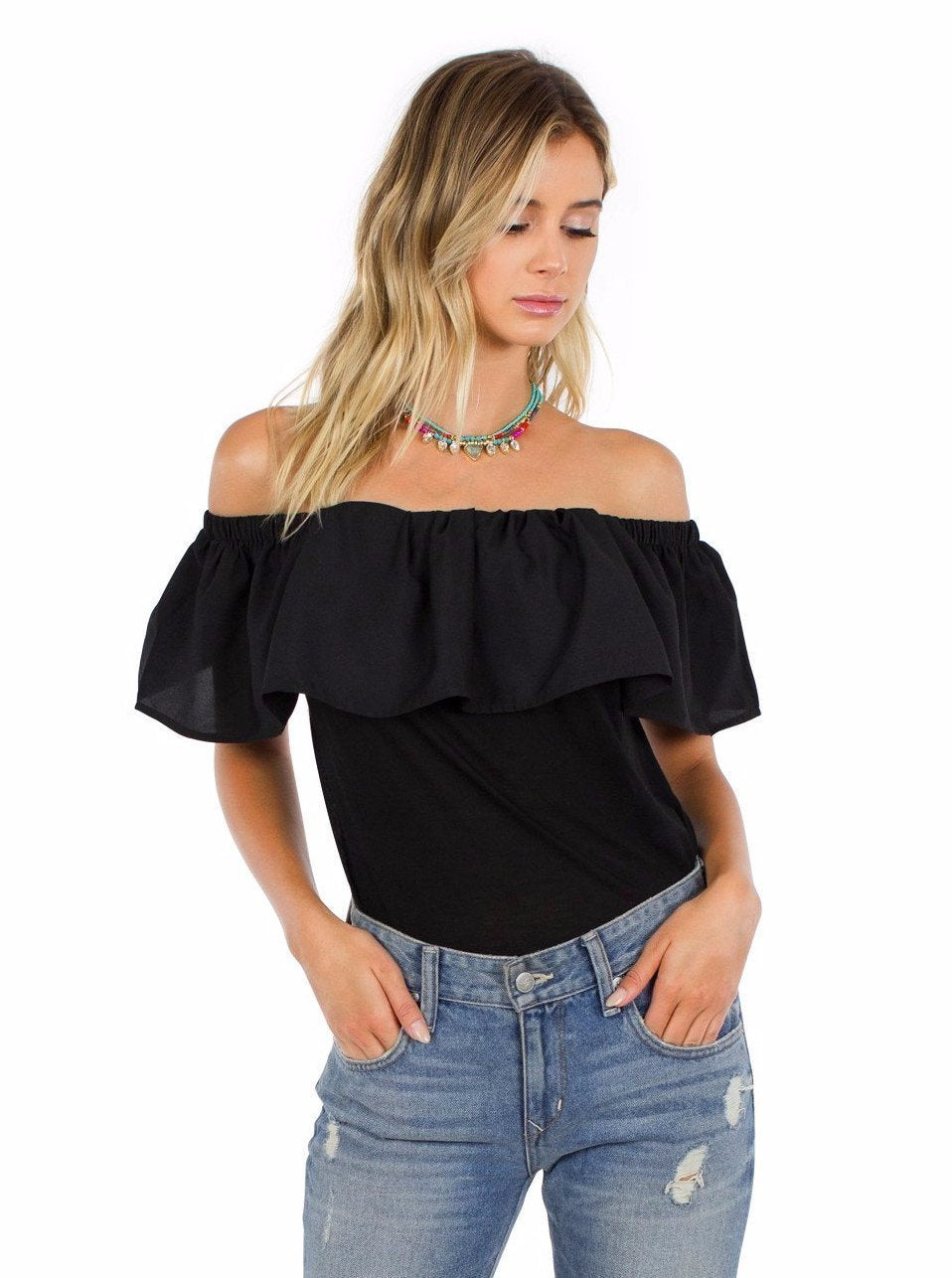 Woman wearing a top rental from French Connection called Polly Plains Off-the-shoulder Top