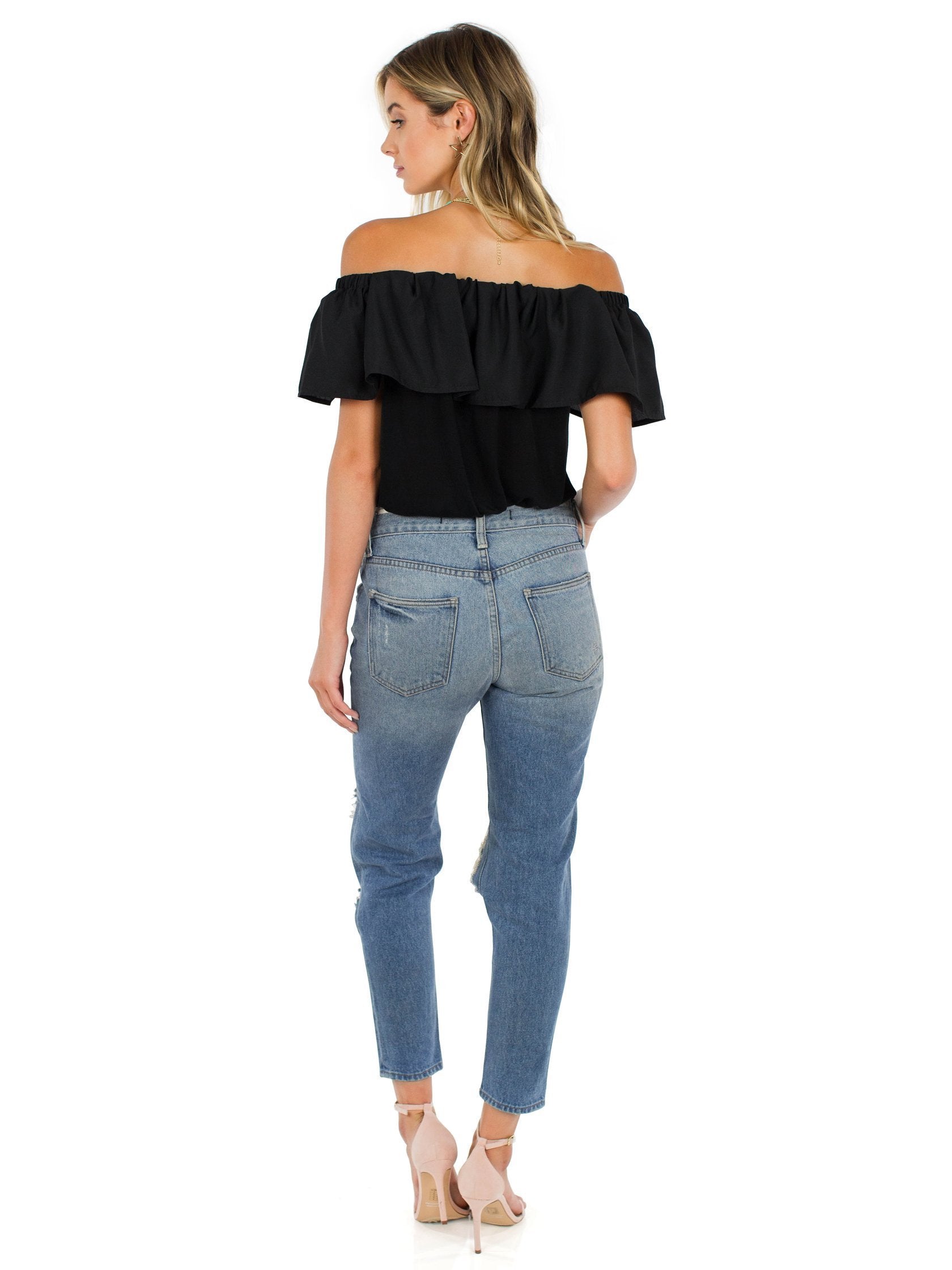 Girl wearing a top rental from French Connection called Polly Plains Off-the-shoulder Top