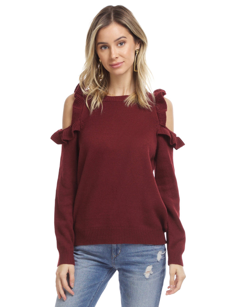 Women wearing a sweater rental from FashionPass called Harmony Cold Shoulder Sweater