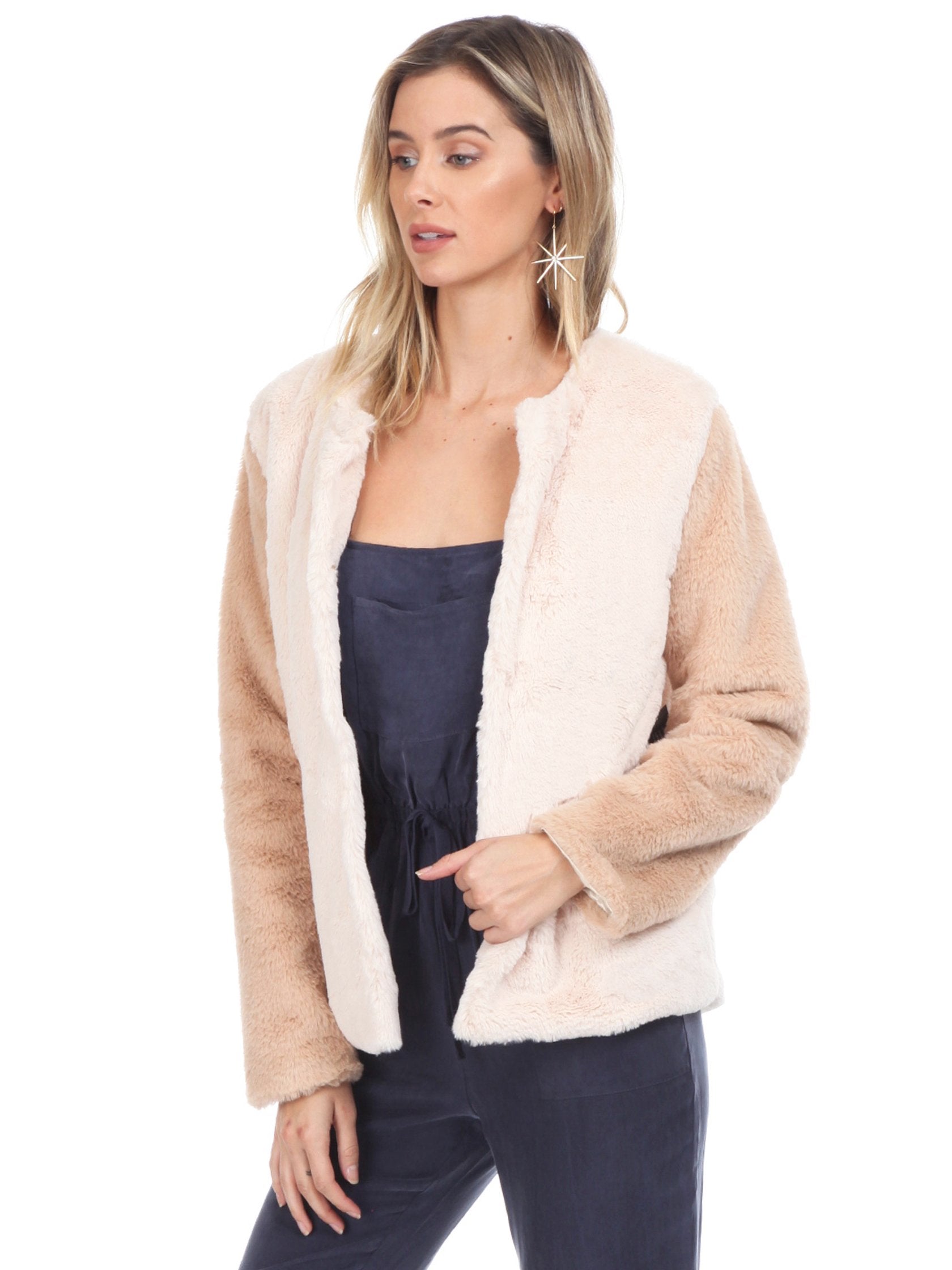 Women wearing a jacket rental from WYLDR called Heidi Faux Fur Jacket