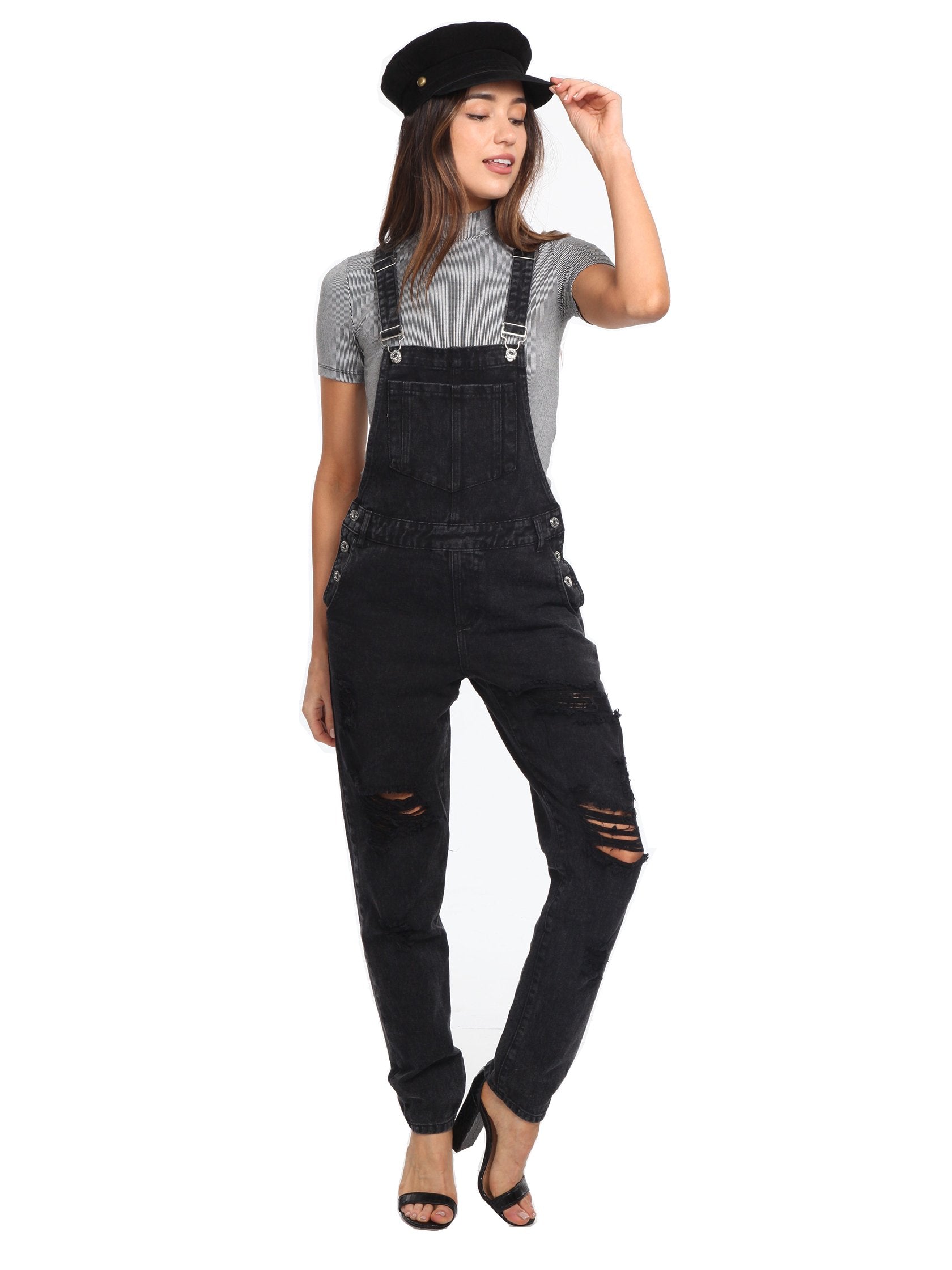 Girl wearing a jumpsuit rental from FashionPass called Here For A Good Time Overalls