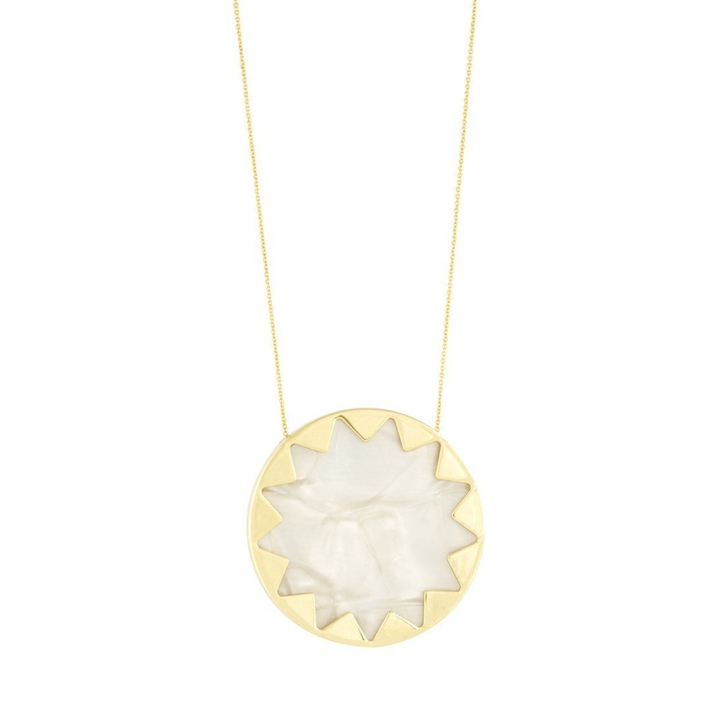 Women wearing a necklace rental from House of Harlow 1960 called Pearl Large Sunburst Necklace