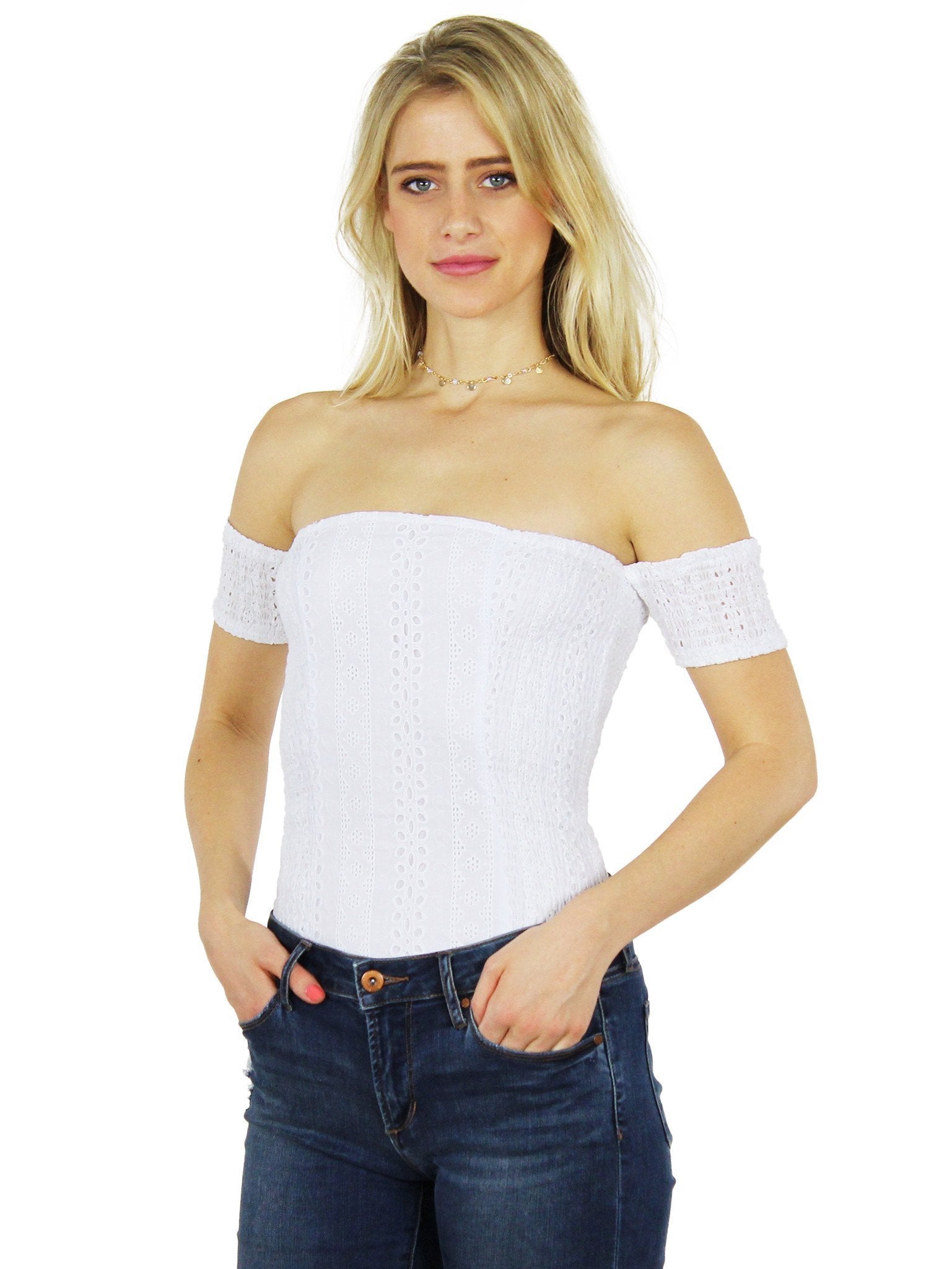 Woman wearing a top rental from J.O.A. called Off Shoulder Eyelet Bodysuit