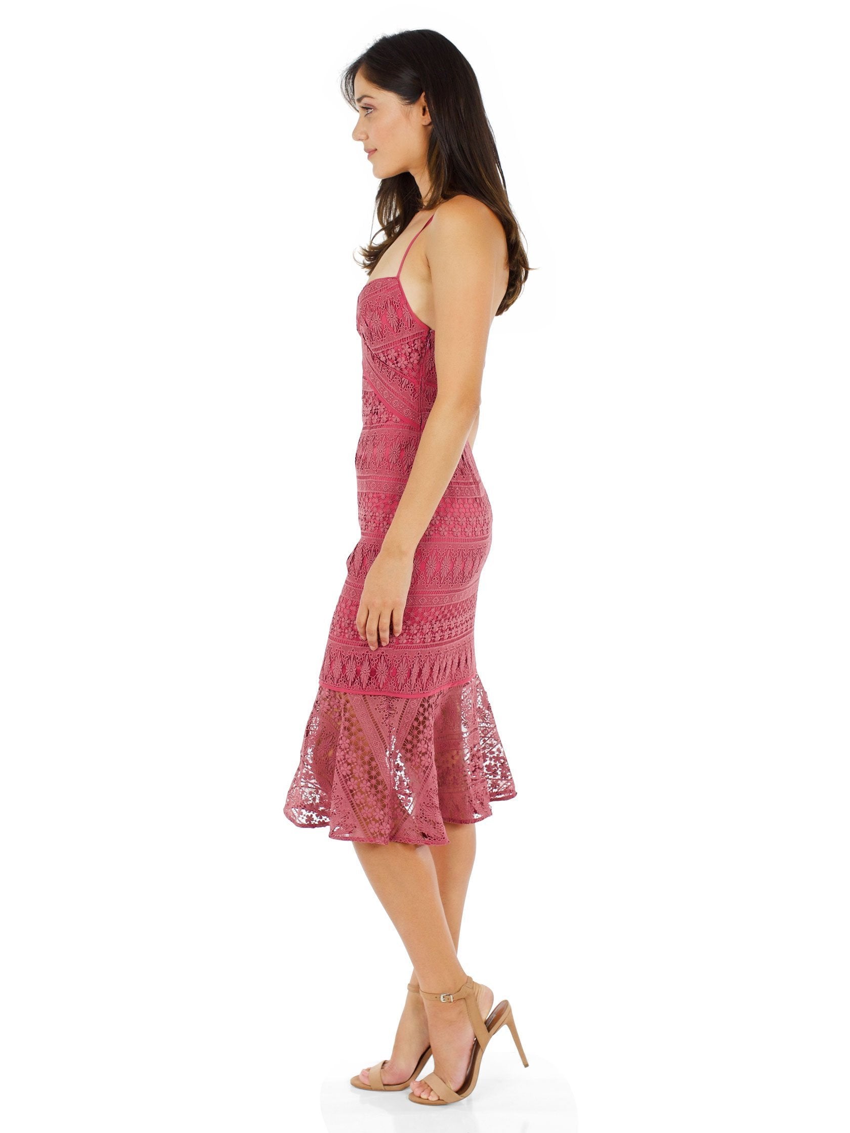 Woman wearing a dress rental from LIKELY called Darby Dress
