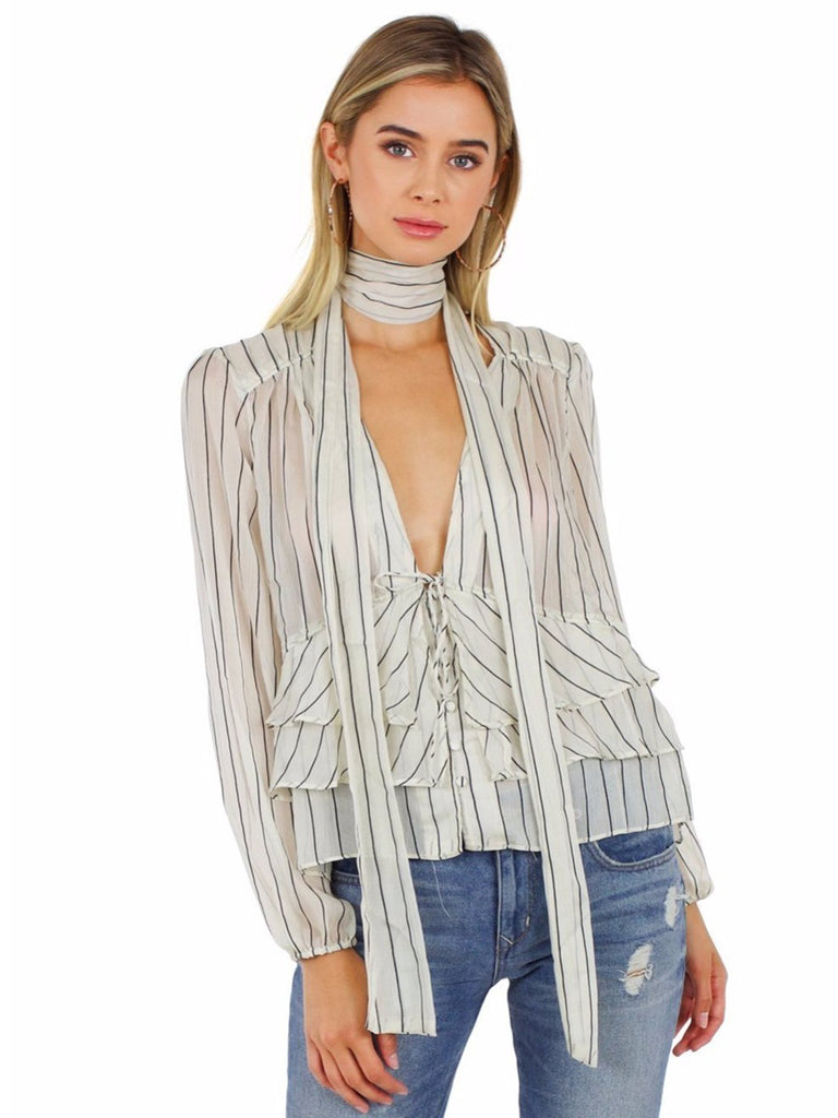 Girl outfit in a top rental from Line & Dot called Crystal Pleated Kimono Tie Front Top