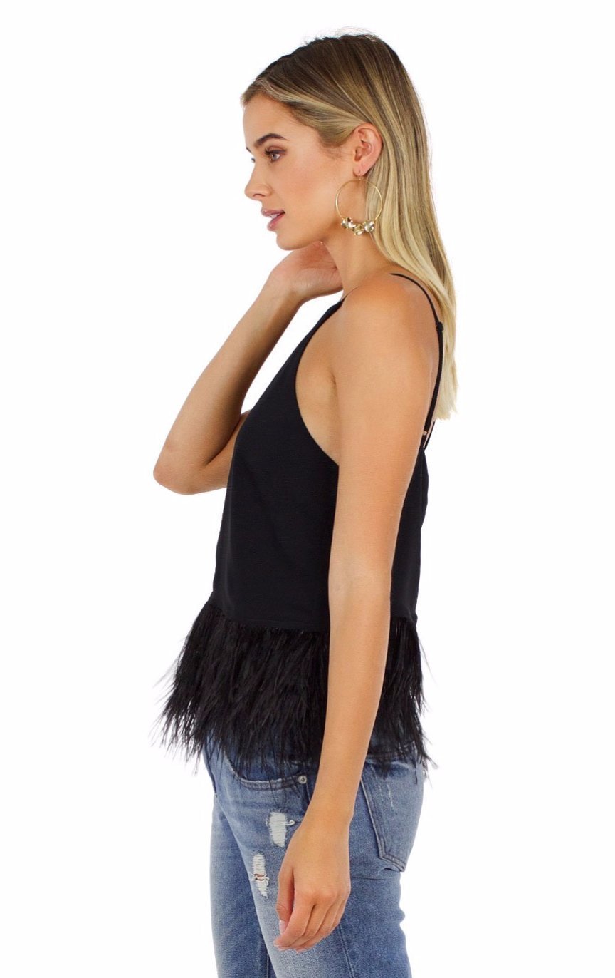 Woman wearing a top rental from Line & Dot called Keira Ostrich Cami