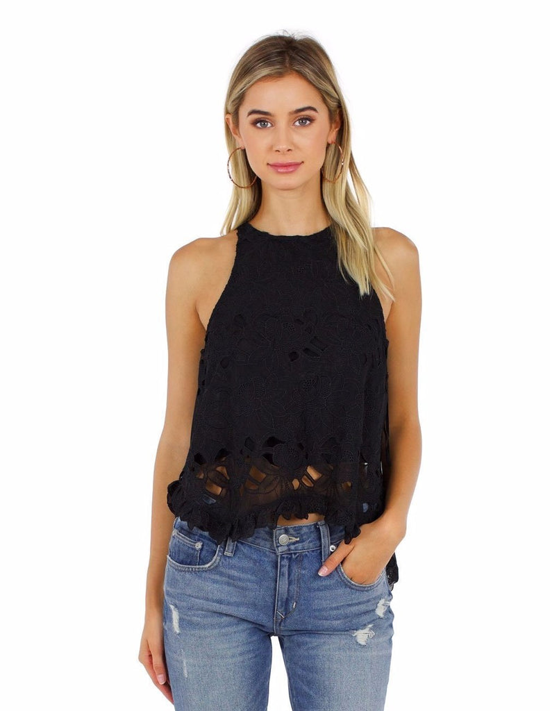 Woman wearing a top rental from Line & Dot called Keira Ostrich Cami
