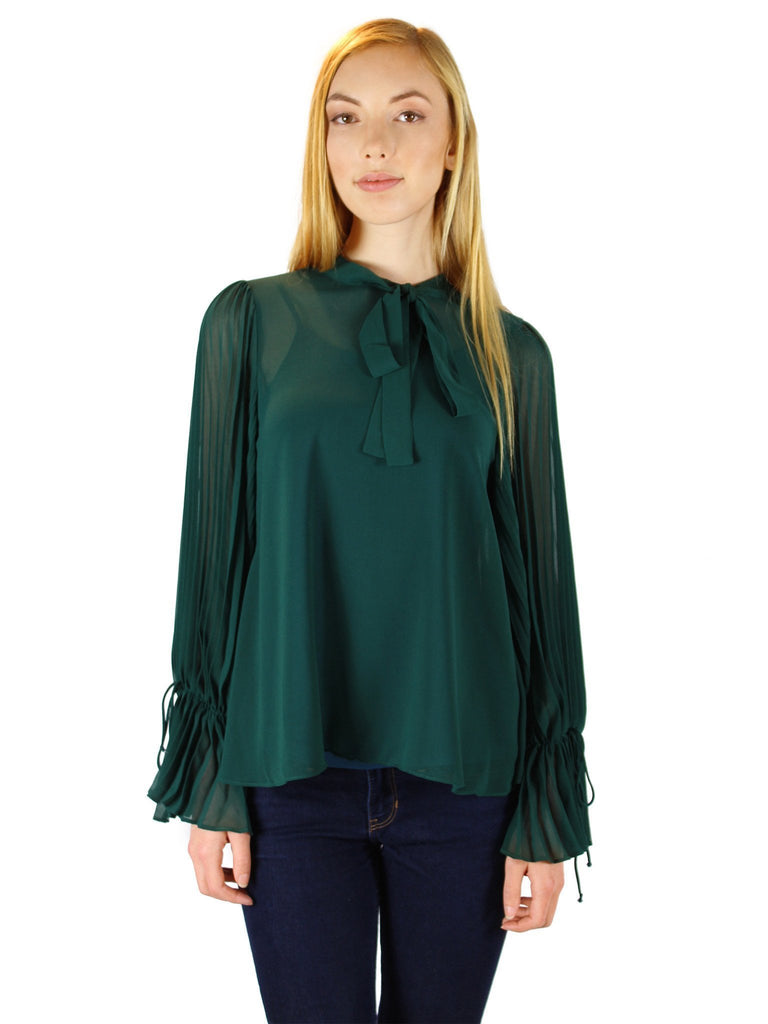 Woman wearing a top rental from Line & Dot called Cold Shoulder Blouson Sleeve Blouse