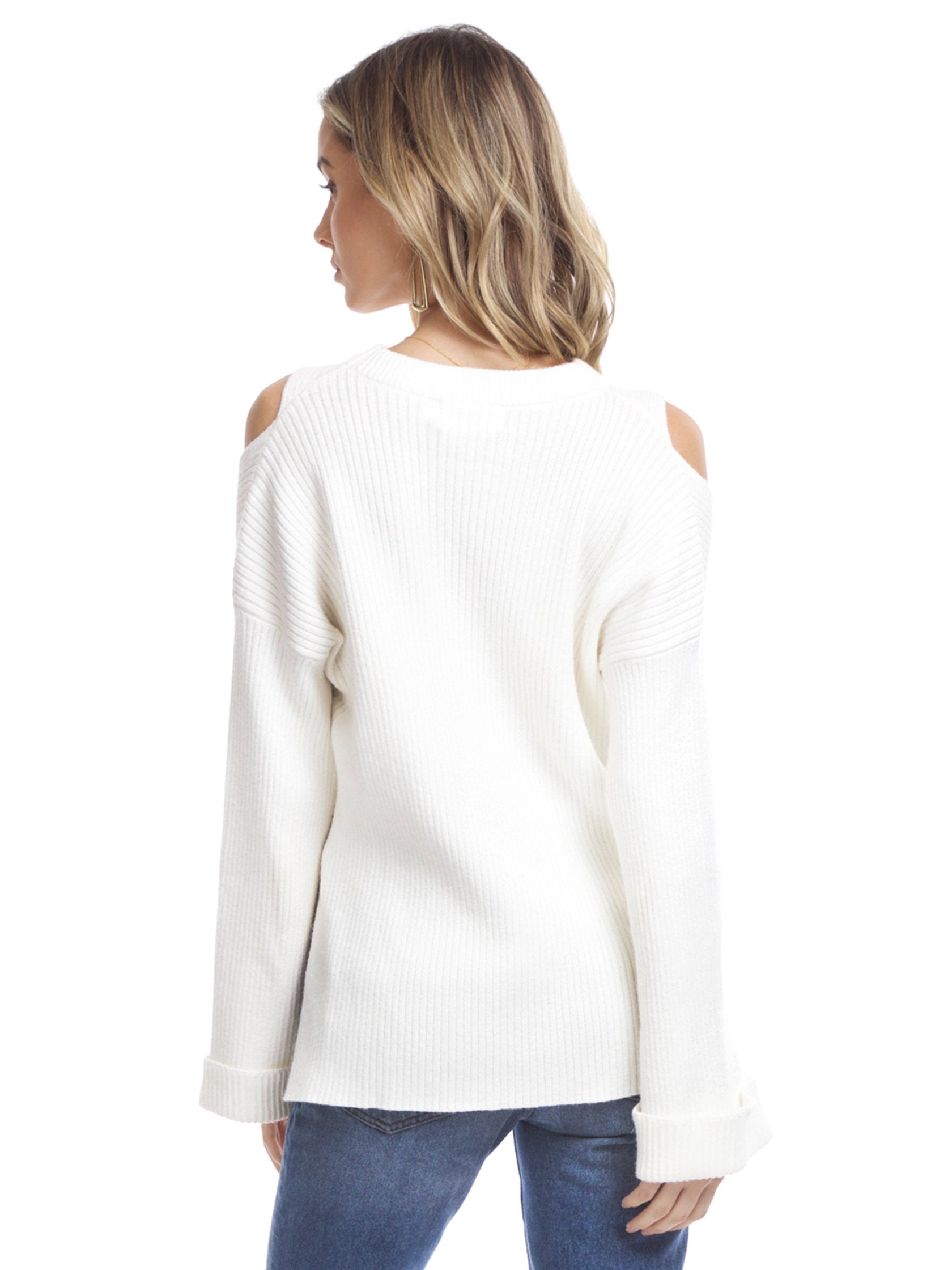 Women outfit in a sweater rental from Line & Dot called Trou Cold Shoulder Sweater