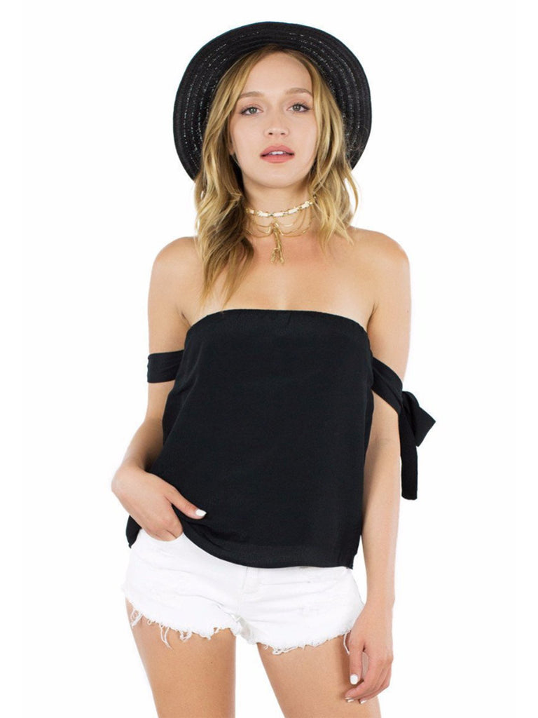 Women wearing a top rental from Lucca Couture called Black Off Shoulder Tie Sleeve Top