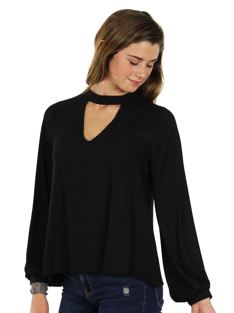 Women wearing a top rental from Lush called Cut Out Long Sleeve Blouse
