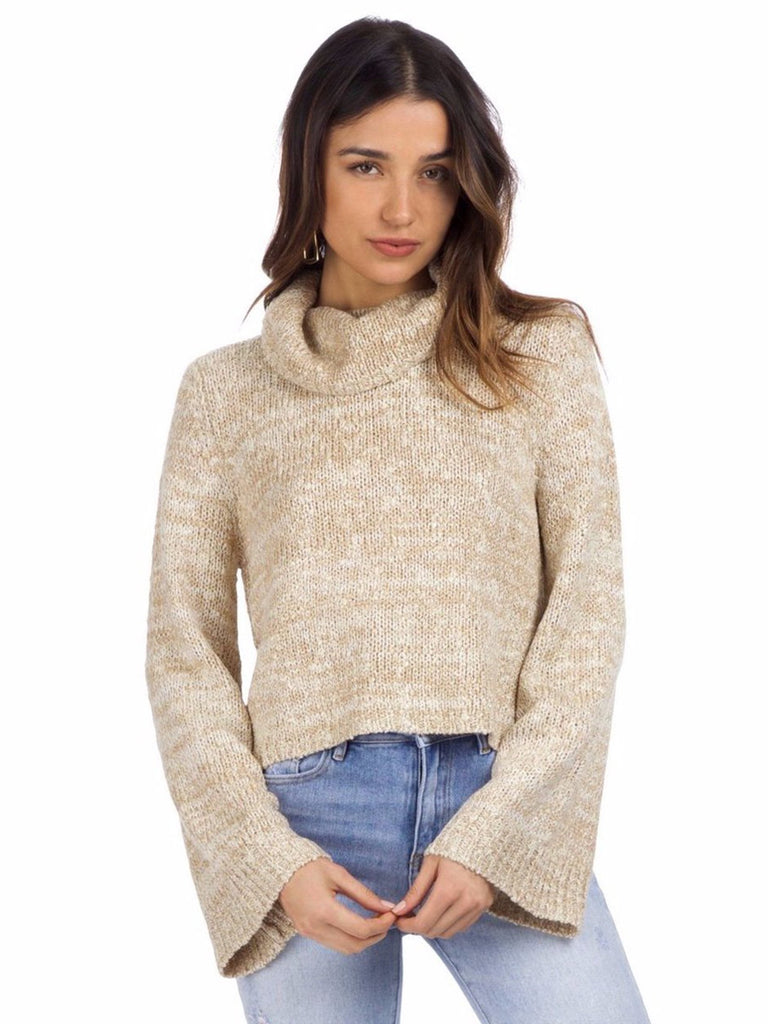 Women wearing a sweater rental from MINKPINK called La Chargers Jersey
