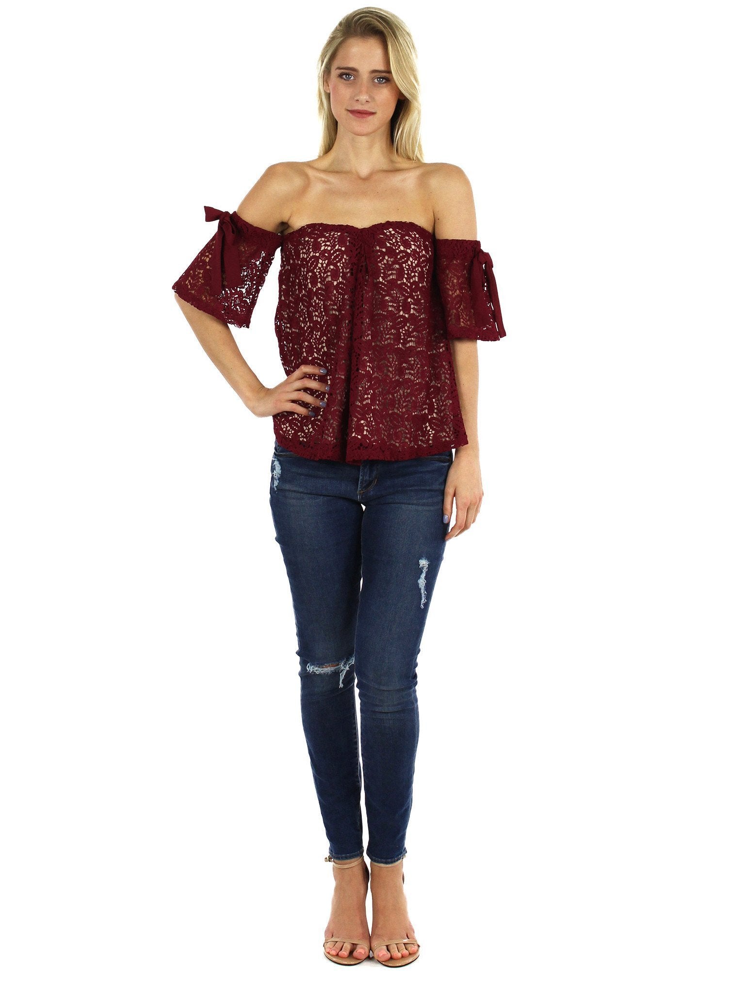 Women wearing a top rental from Moon River called Off Shoulder Lace Top