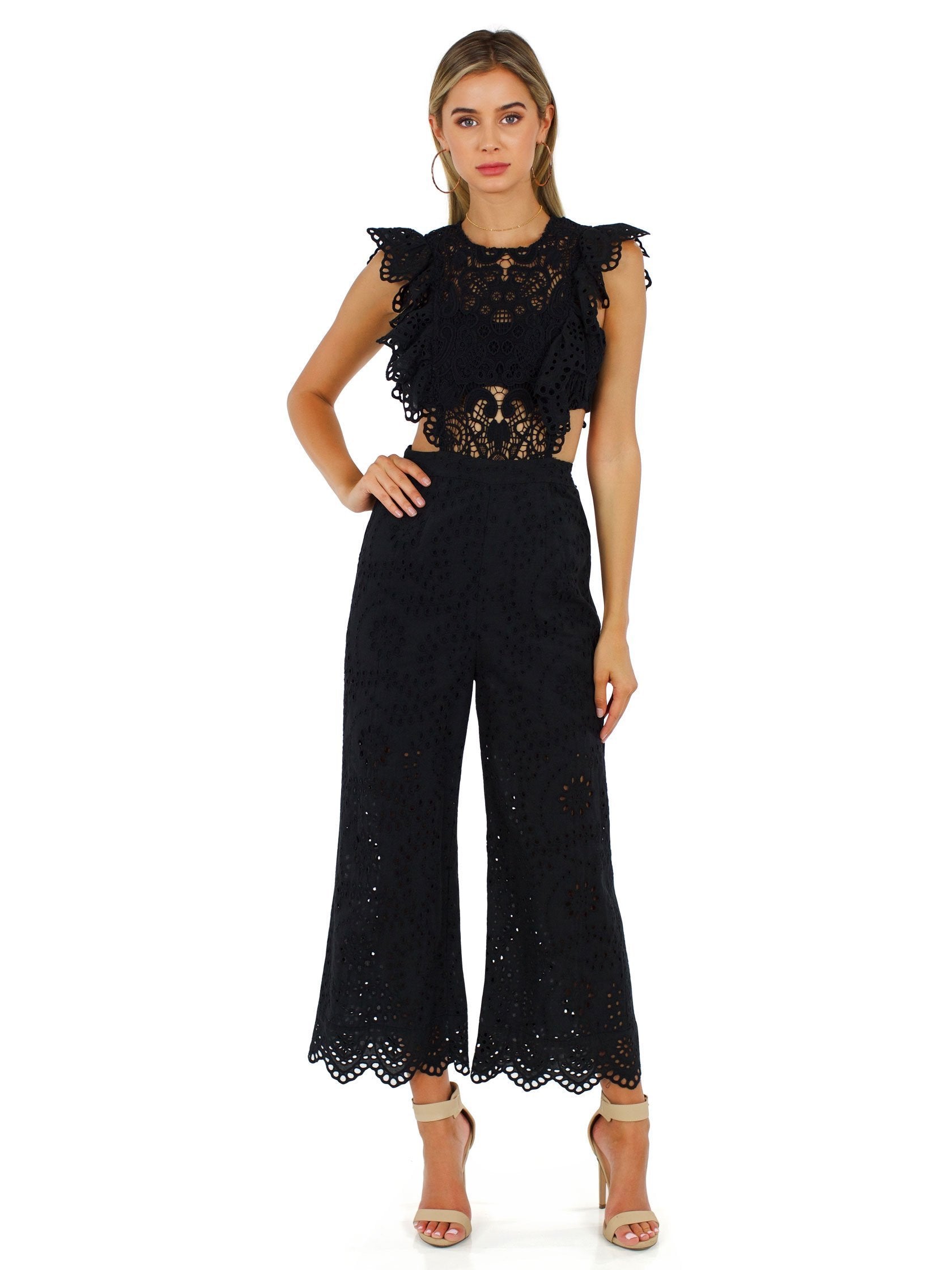 Girl outfit in a jumpsuit rental from Nightcap Clothing called Eyelet Apron Jumpsuit