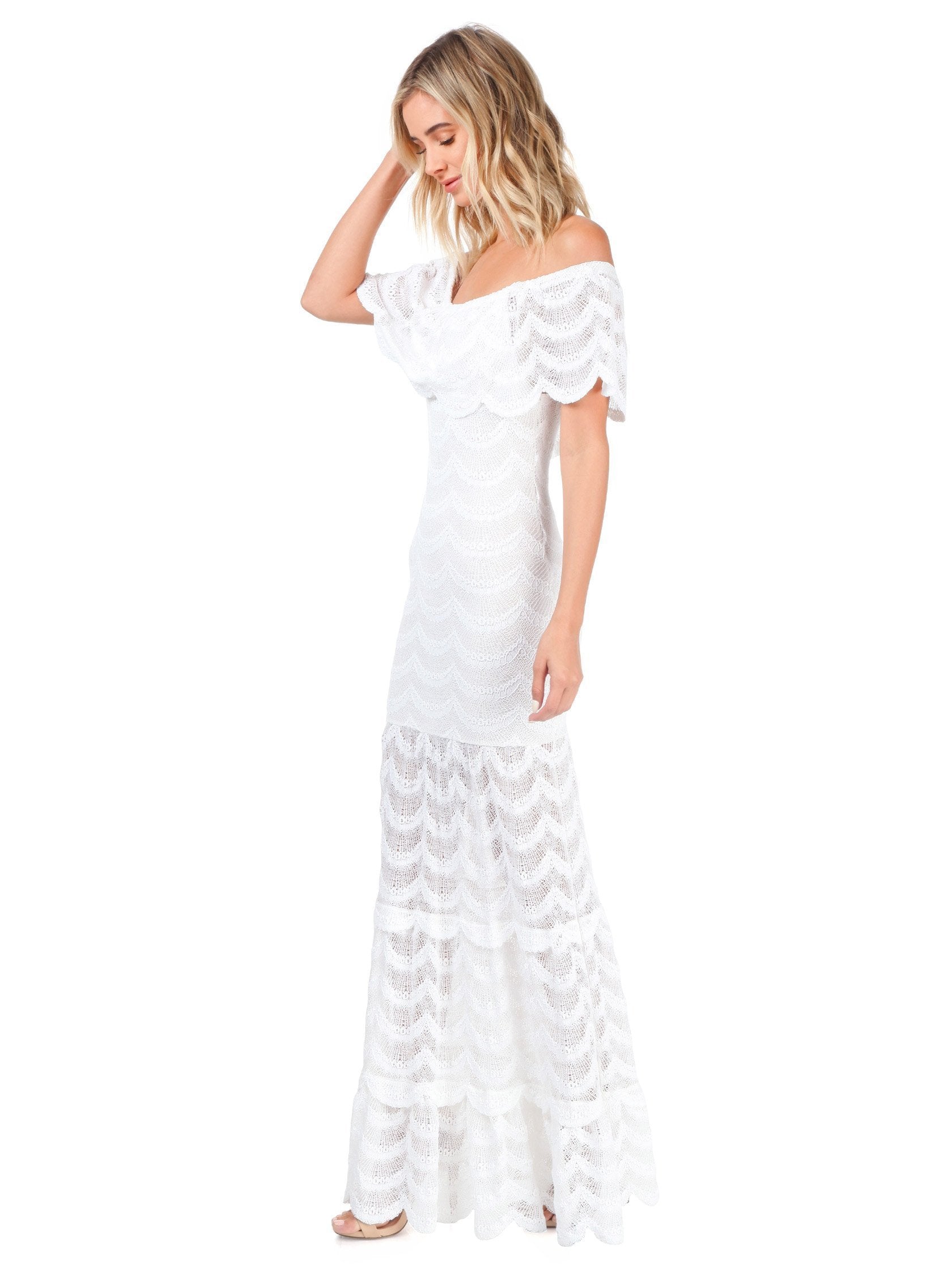 Women outfit in a dress rental from Nightcap Clothing called Fiesta Fan Lace Positano Maxi